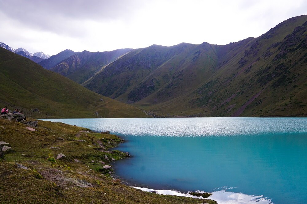 Shimmery blue and emerald-like waters of Kol-Tor Lake on our trek, who knew this was just a day trip from Bishkek.