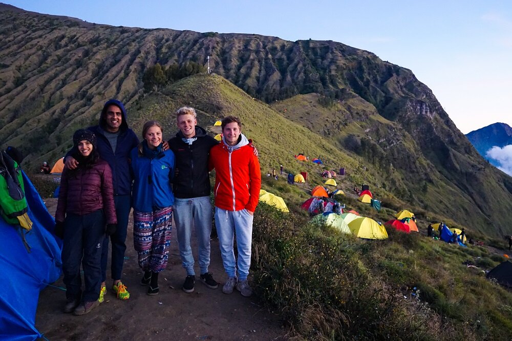 A group of german climbers and us at the ridge of mount rinjani.