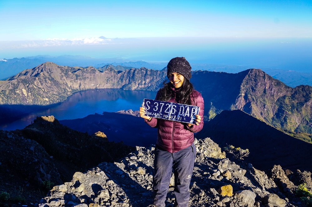 beyond elated and tired after reaching the summit of mount rinjani
