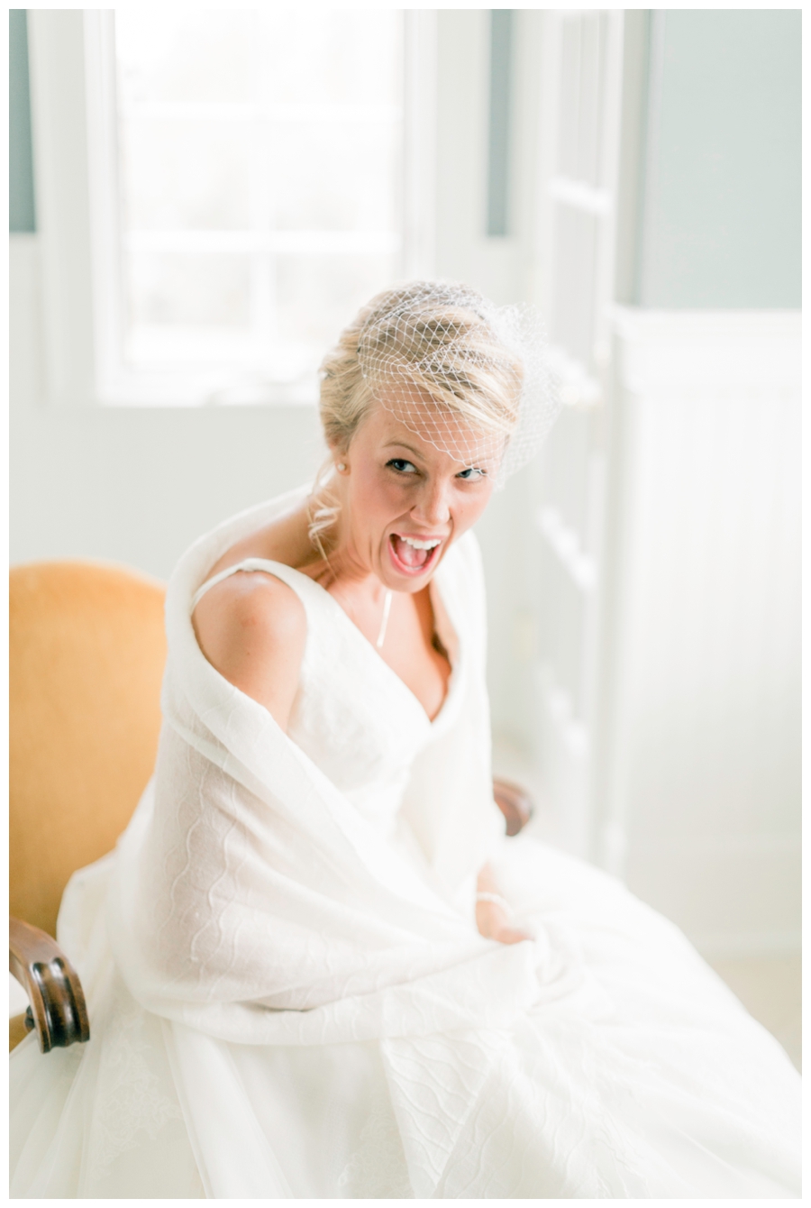 Light and Airy Photos of the bride in front of a window_0010.jpg