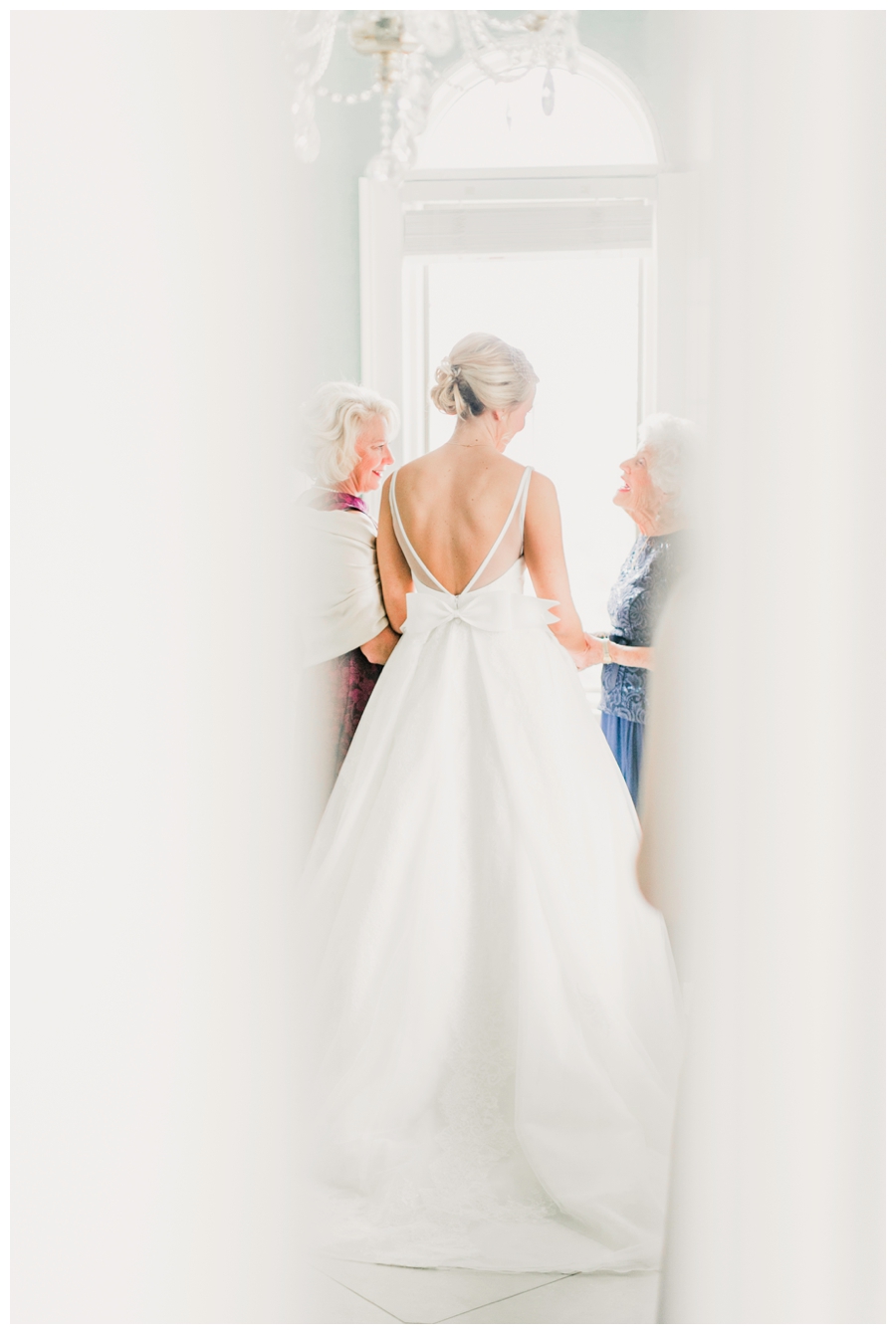 Light and Airy Photos of the bride in front of a window_0016.jpg