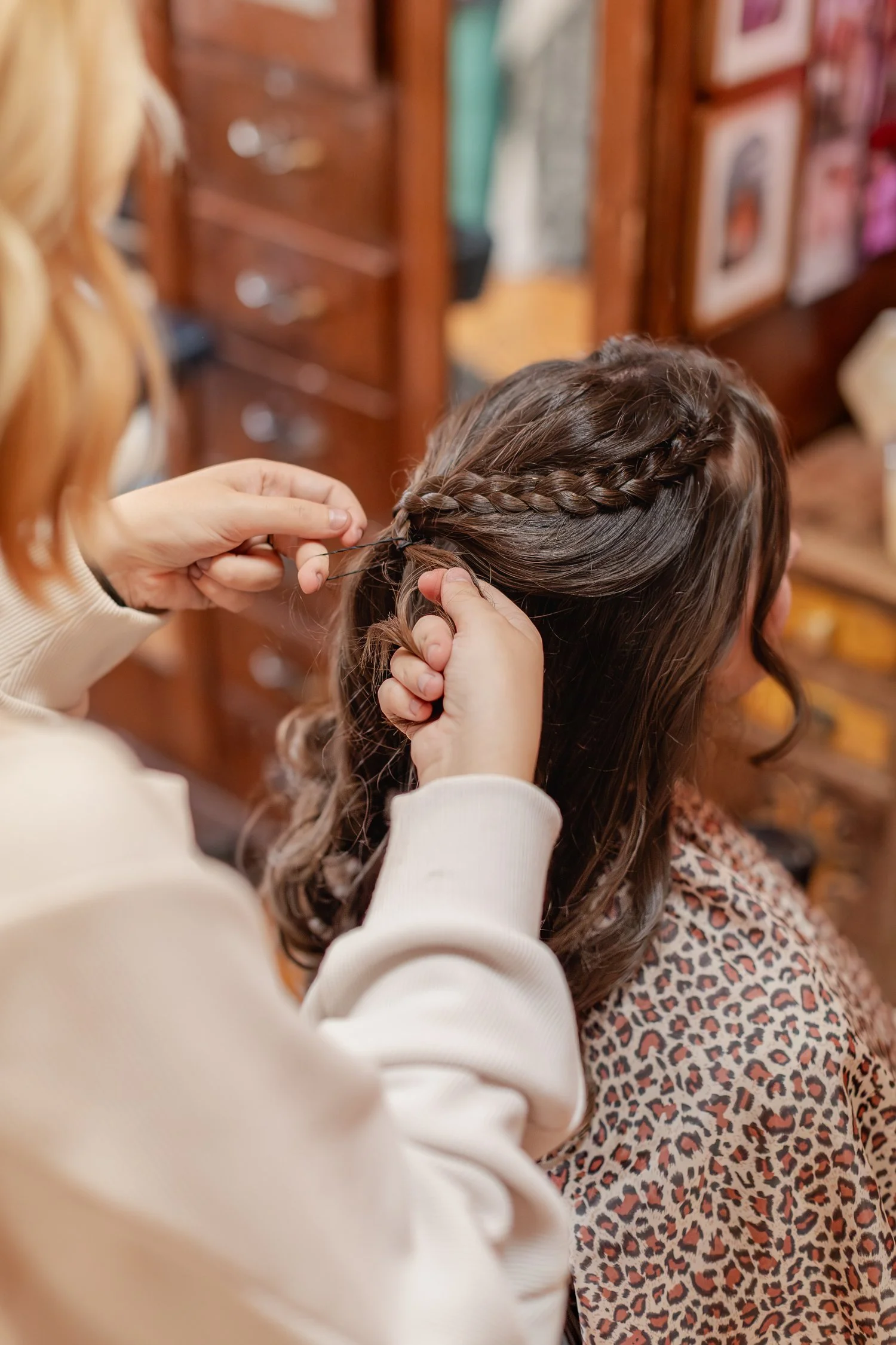 close up of a small braid along the side of a client's curled hair, Hair, Heart and Soul, brand photography session, Bolivar MO