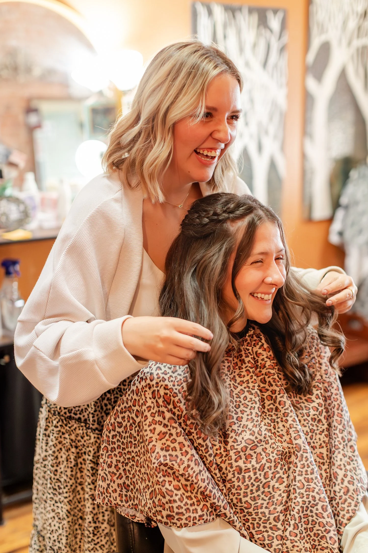 stylist and client laughing over the finished curls, Hair, Heart and Soul, brand photography session, Bolivar MO
