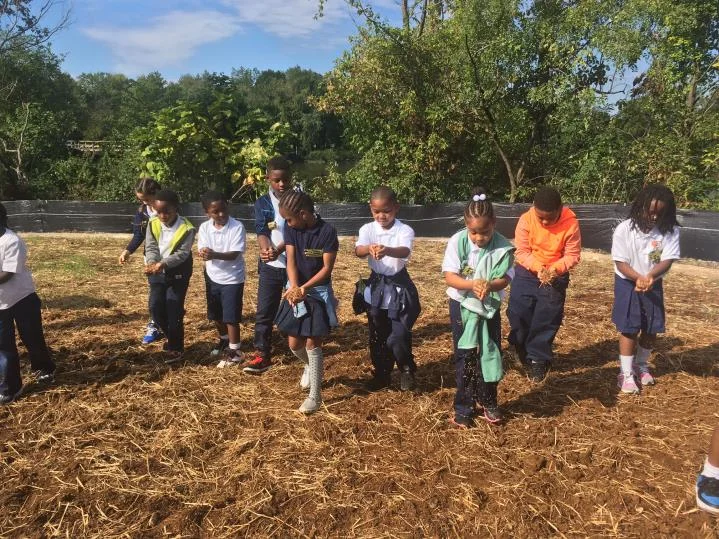 Kids participate in Anacostia Watershed Society’s Saving our Native Grasslands program, funded by DOEE's Community Stormwater Solutions program. Image source: Anacostia Watershed Society.