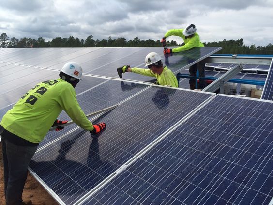 Image: Washington Post . Solar farms create jobs and produce energy and reduce costs of nearby facilities.