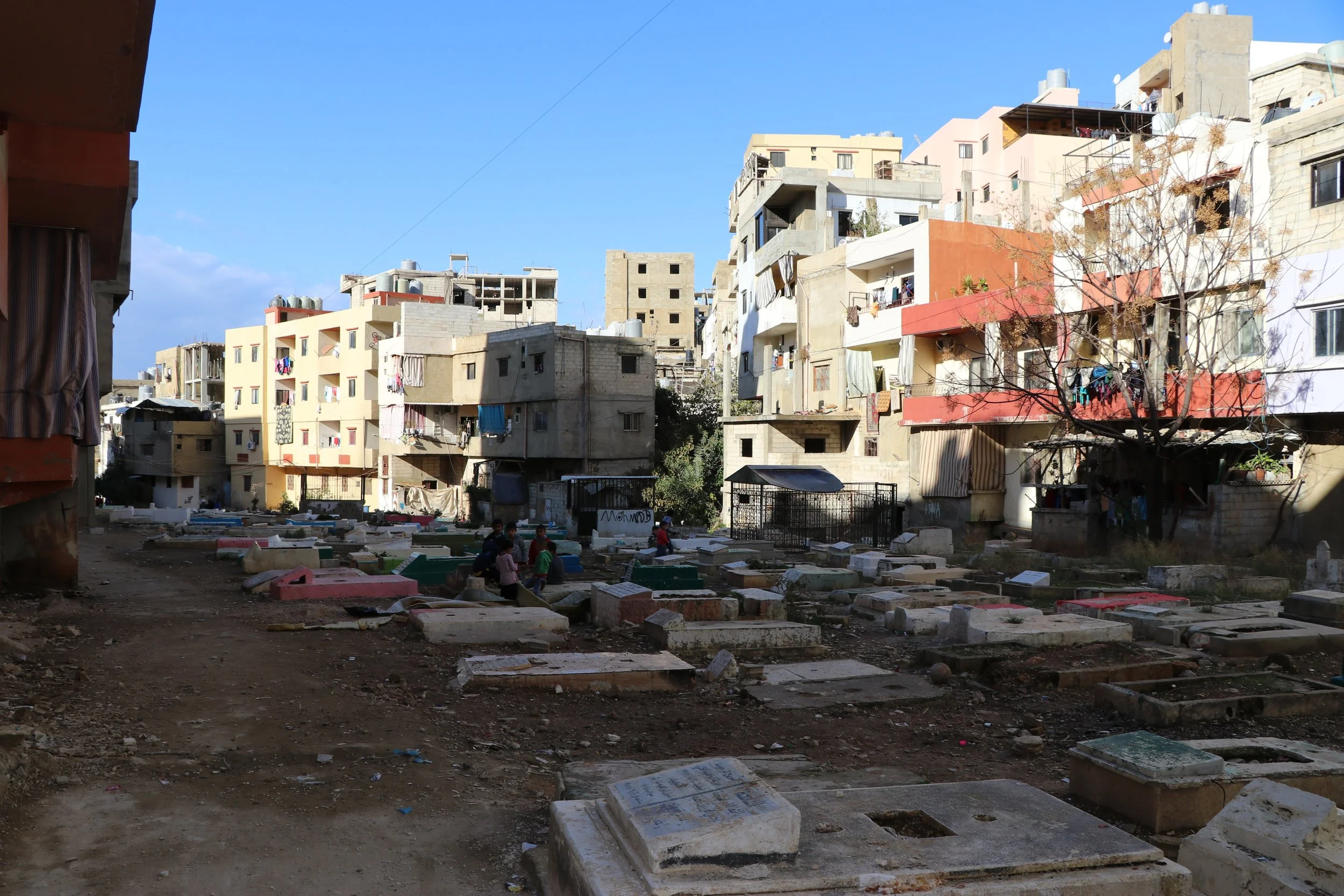 The cemetery is one of the only ‘open spaces’ in the camp, and is – and always has been – an important space for children to play. (c) E. Fiddian-Qasmiyeh. December 2016.