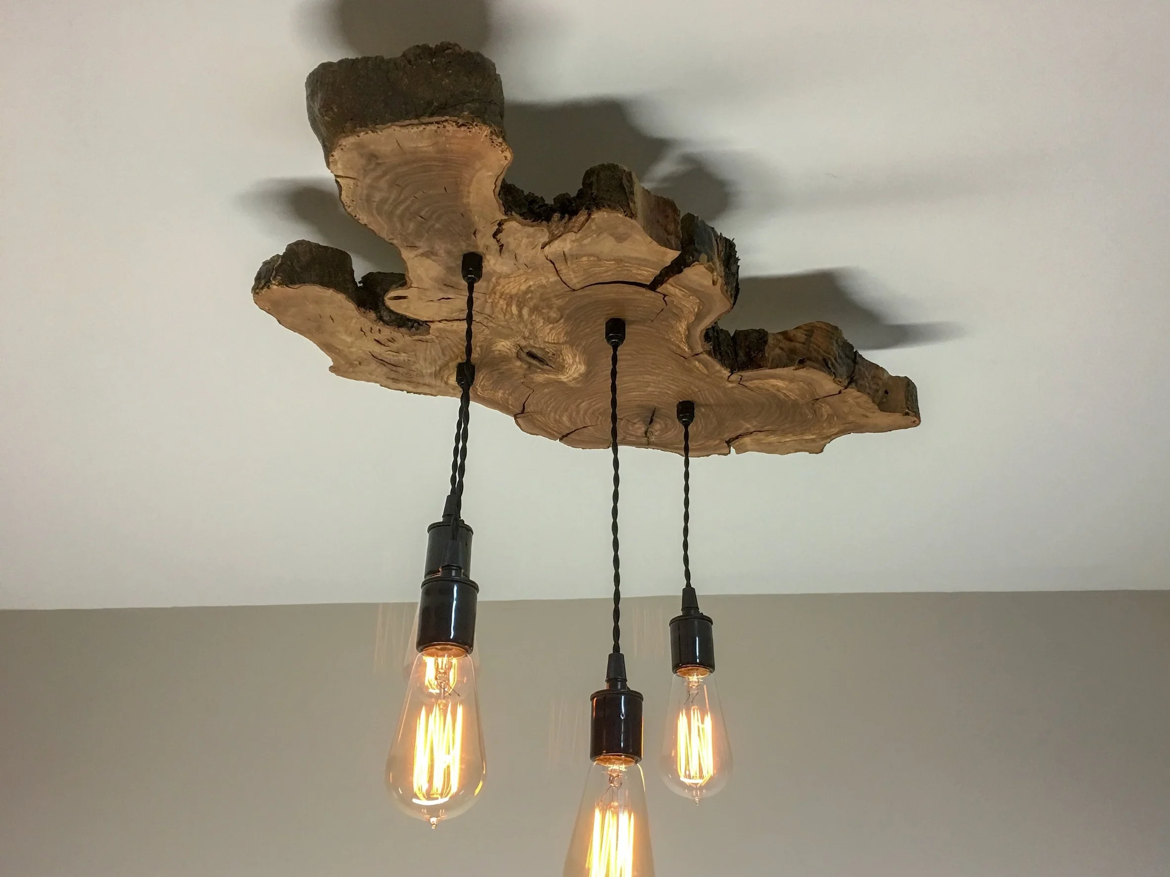 live edge olive wood 4 light