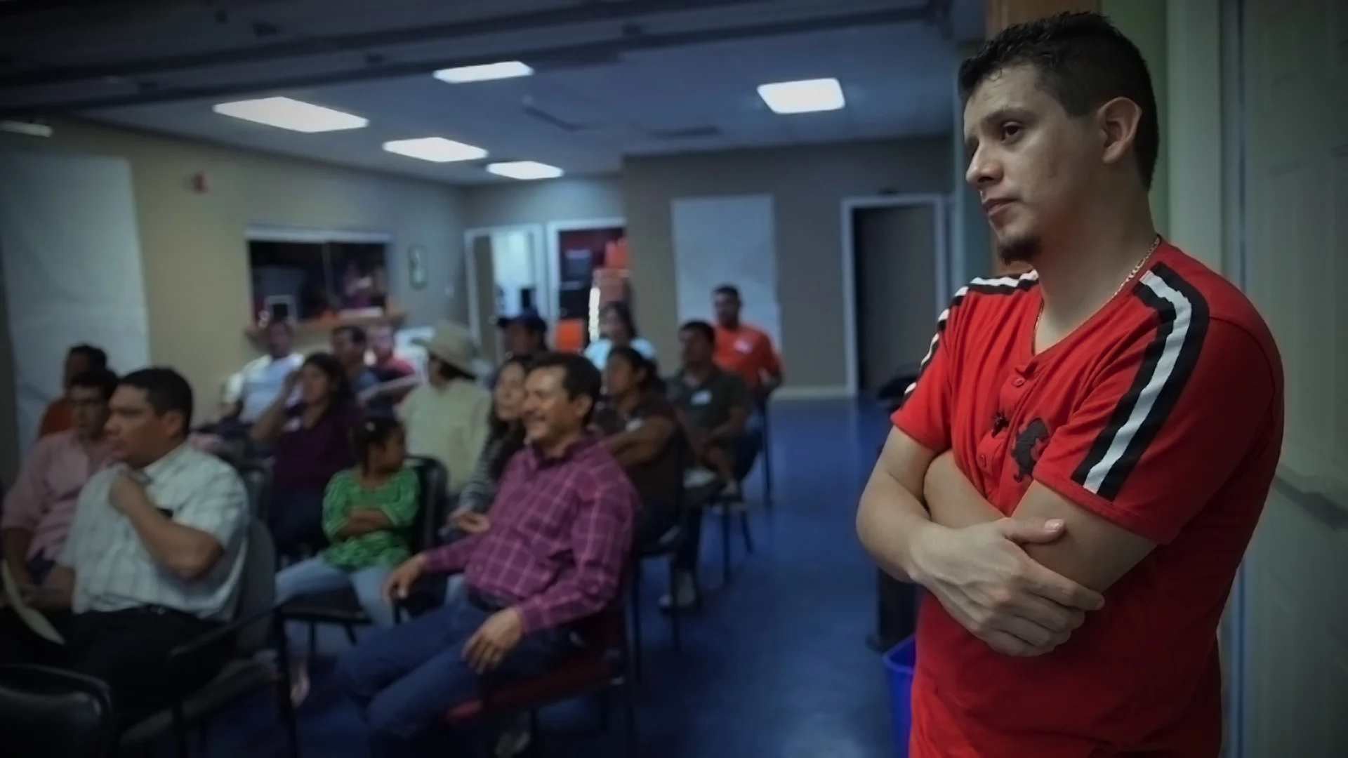 Christian at immigration meeting.jpg