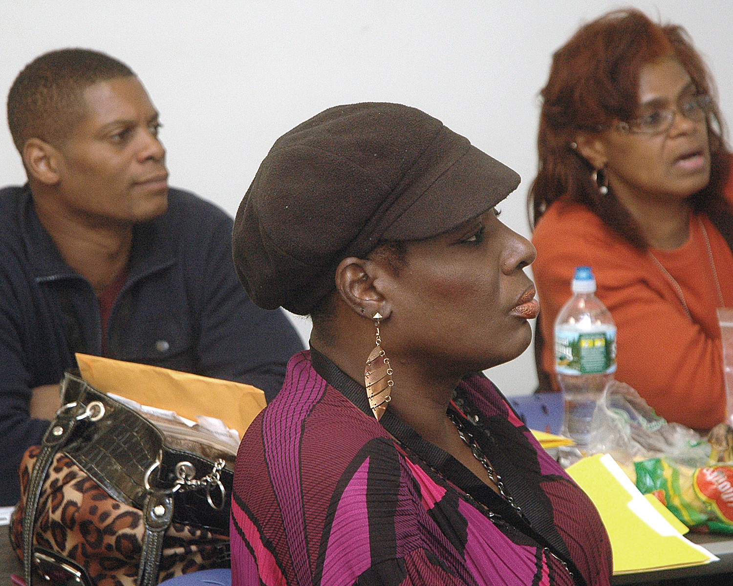 Three members of the Outreach Team during the orientation