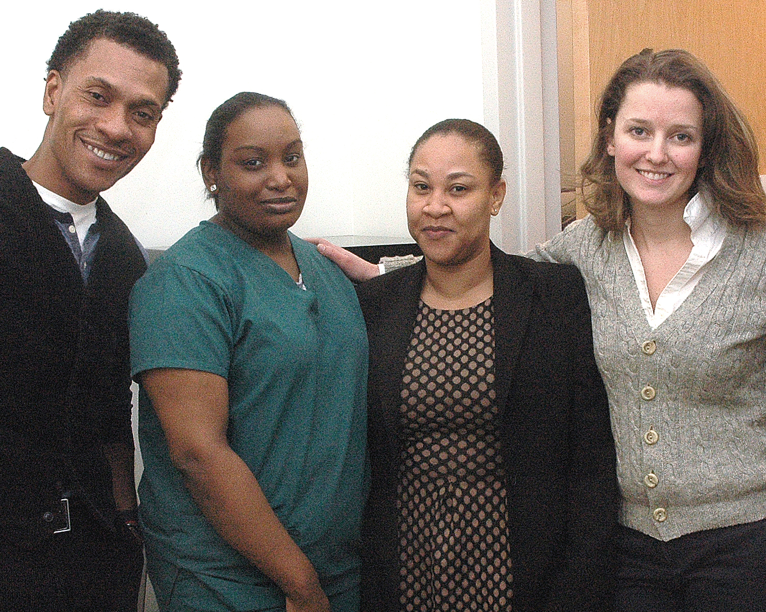 ASCNYC Intake Team: Caroline Anderson, Luis Worrell with two of their interns