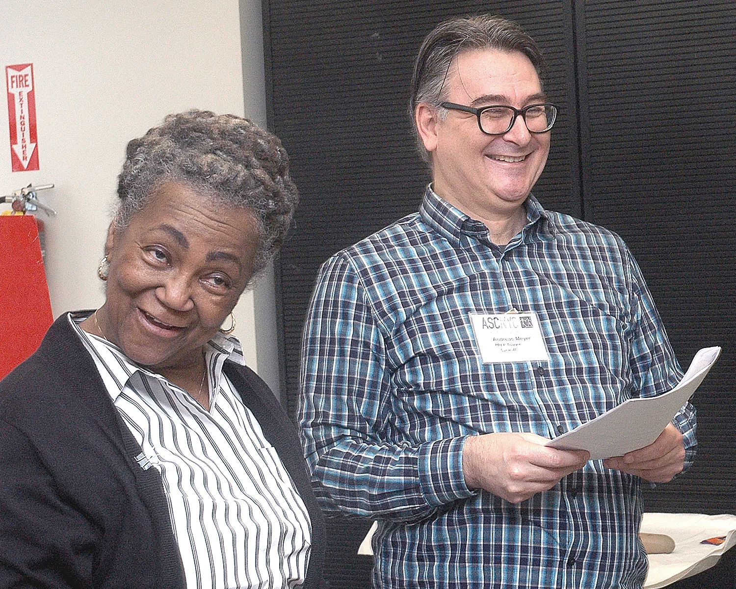 Joyce Myricks and Andreas M. listening to the comments of his final presentation