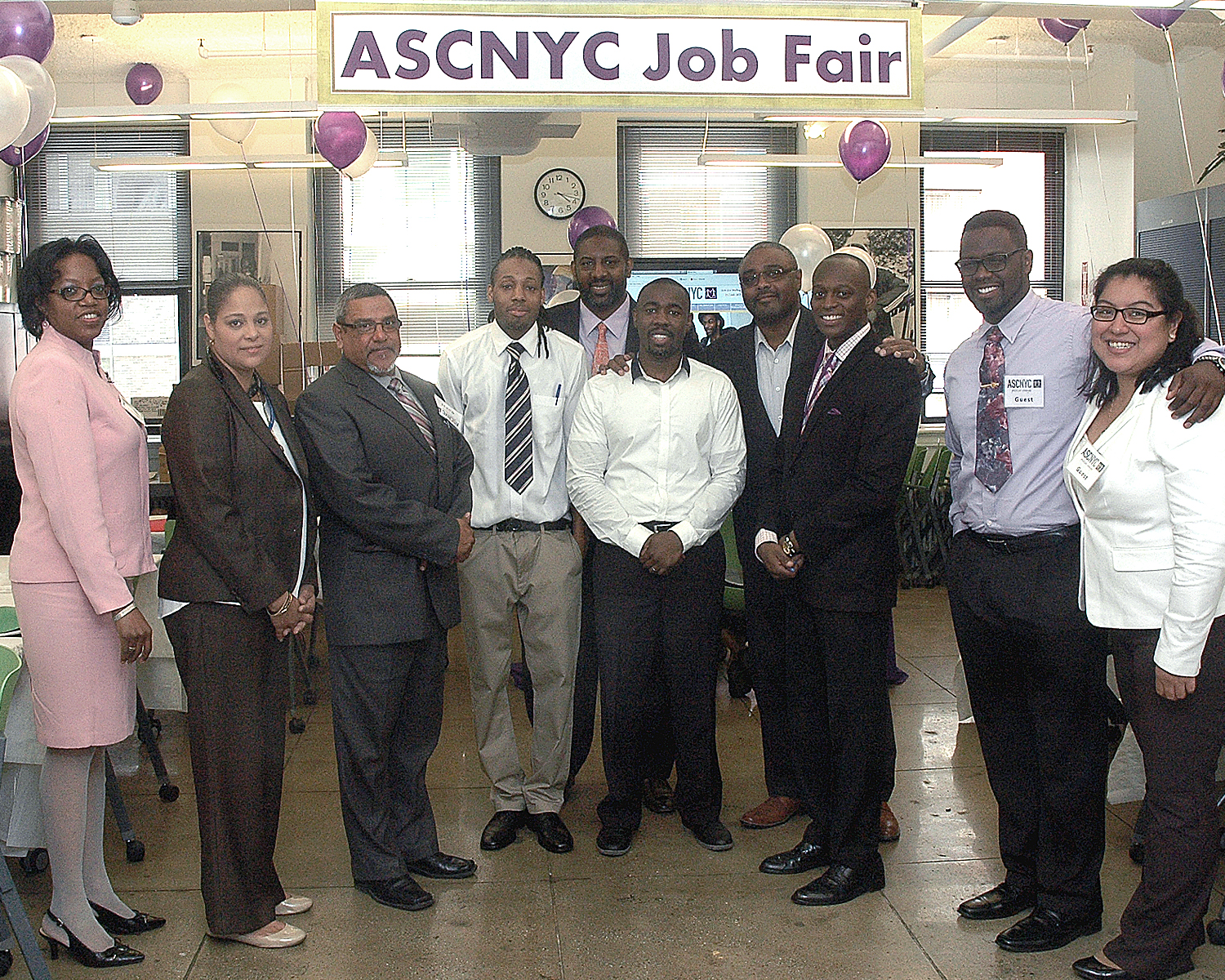 Jean Pierre Louis, Dennis Martin with the Job Fair interviewers and an attendee