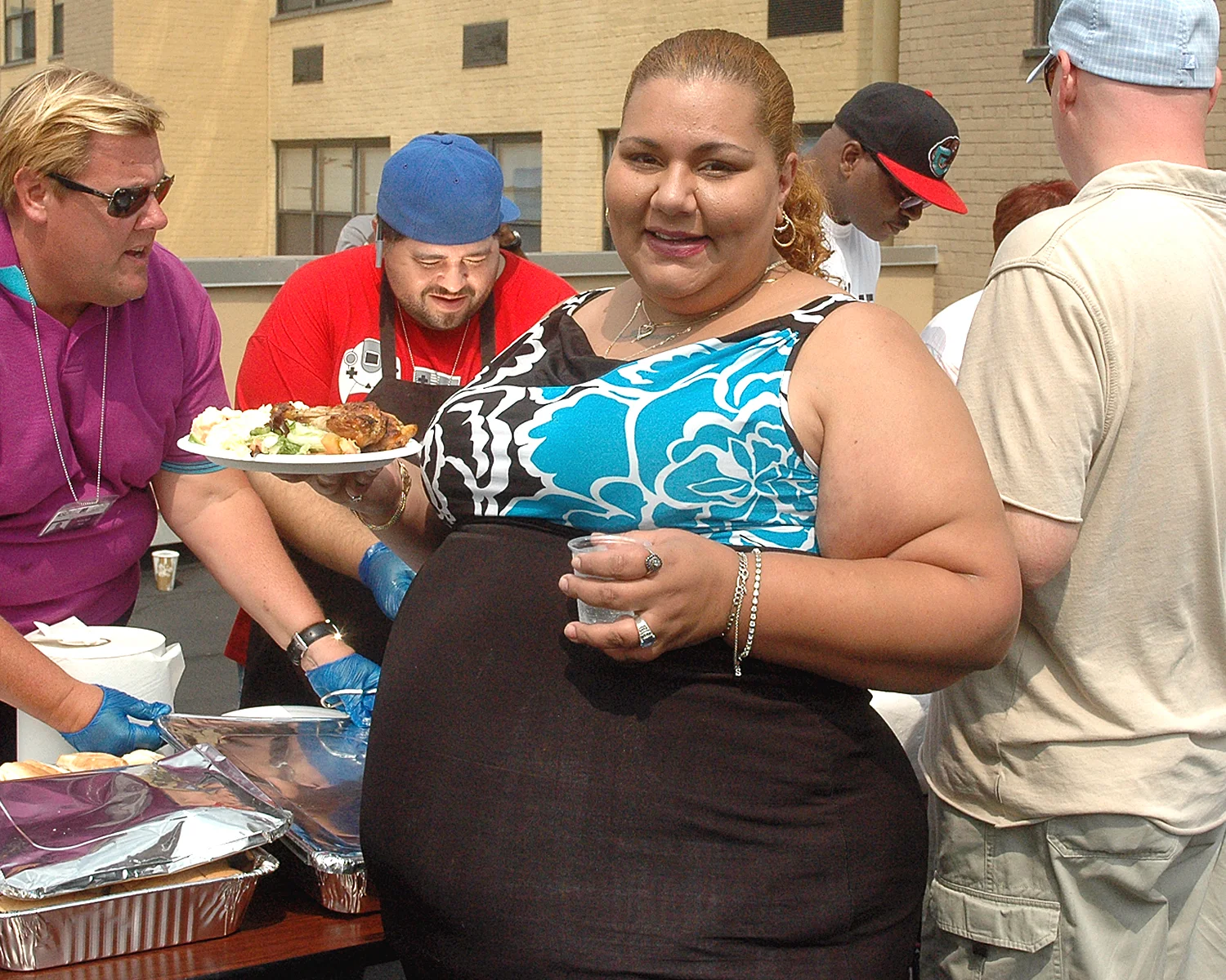 An attendee after she received her food