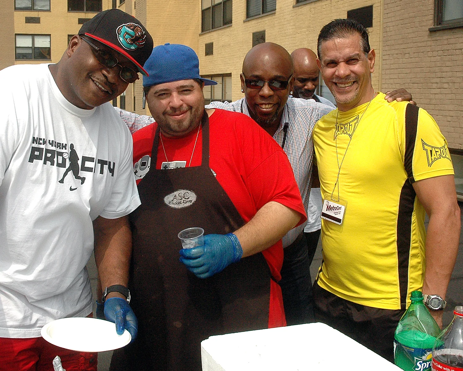 ASCNYC Staff Members Mondo Blue and Frank Barber with two attendees