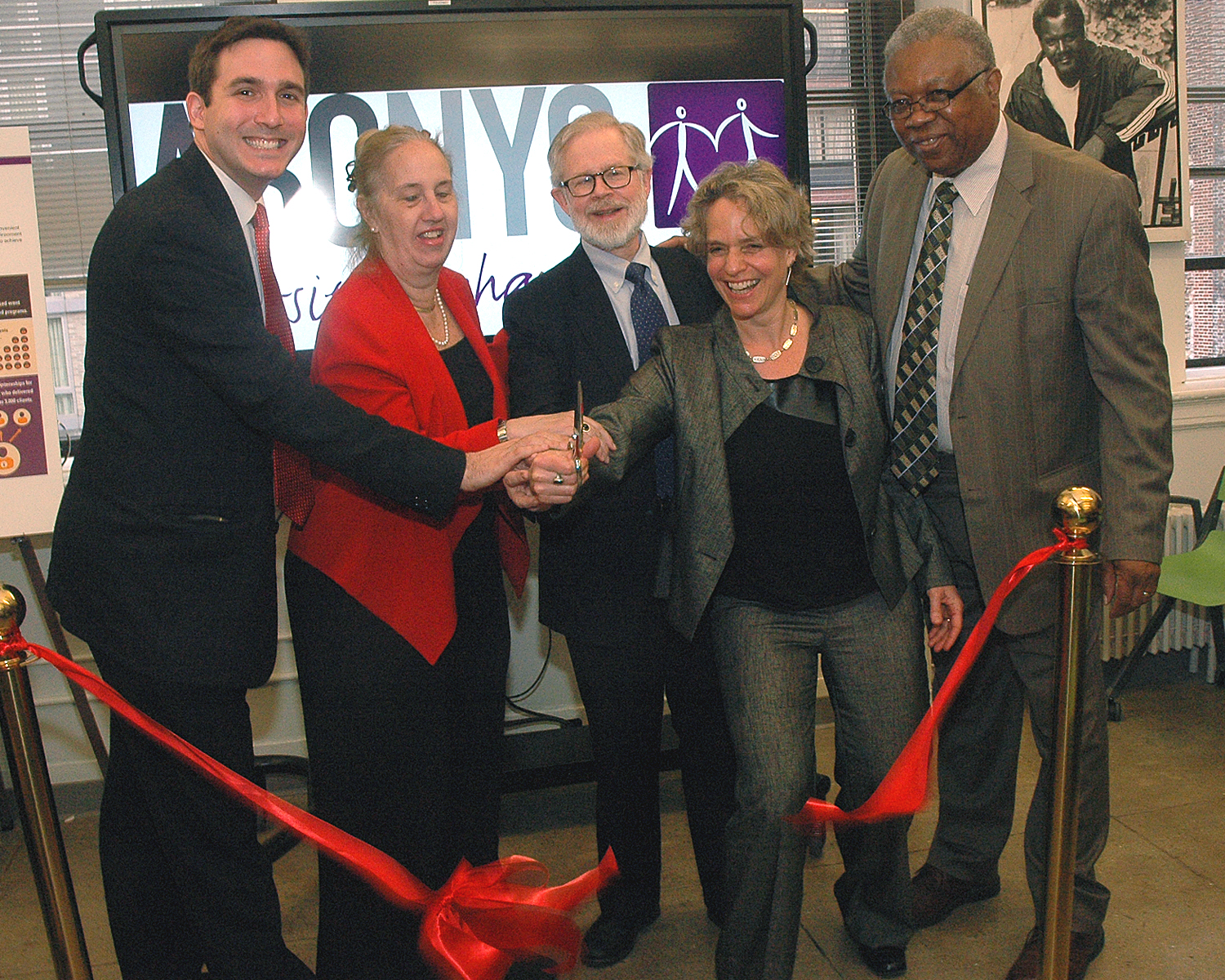 NYC Council Member Ben Kallos, Manhattan Borough President Gale Brewer, NYS Assembly Member Richard N. Gottfried, Sharen Duke and Bill Toler cut the ribbon at ASCNYC's New Midtown Central site.