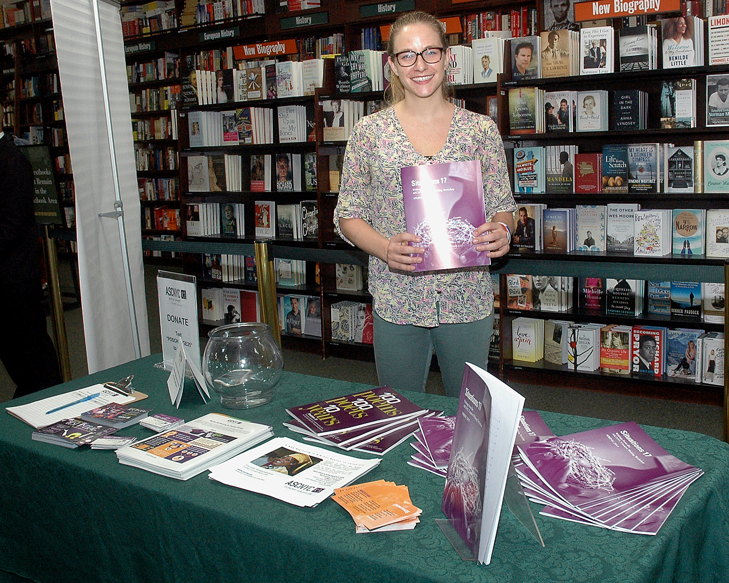 Gwenn Fairall holding the latest edition of Situations