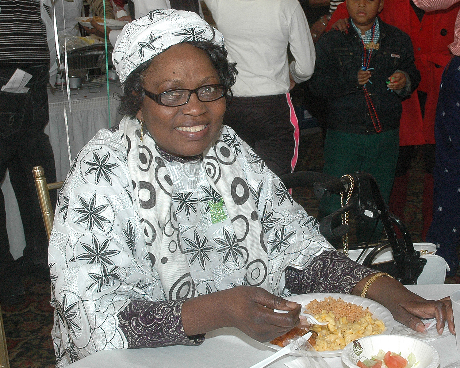 An attendee enjoying her meal