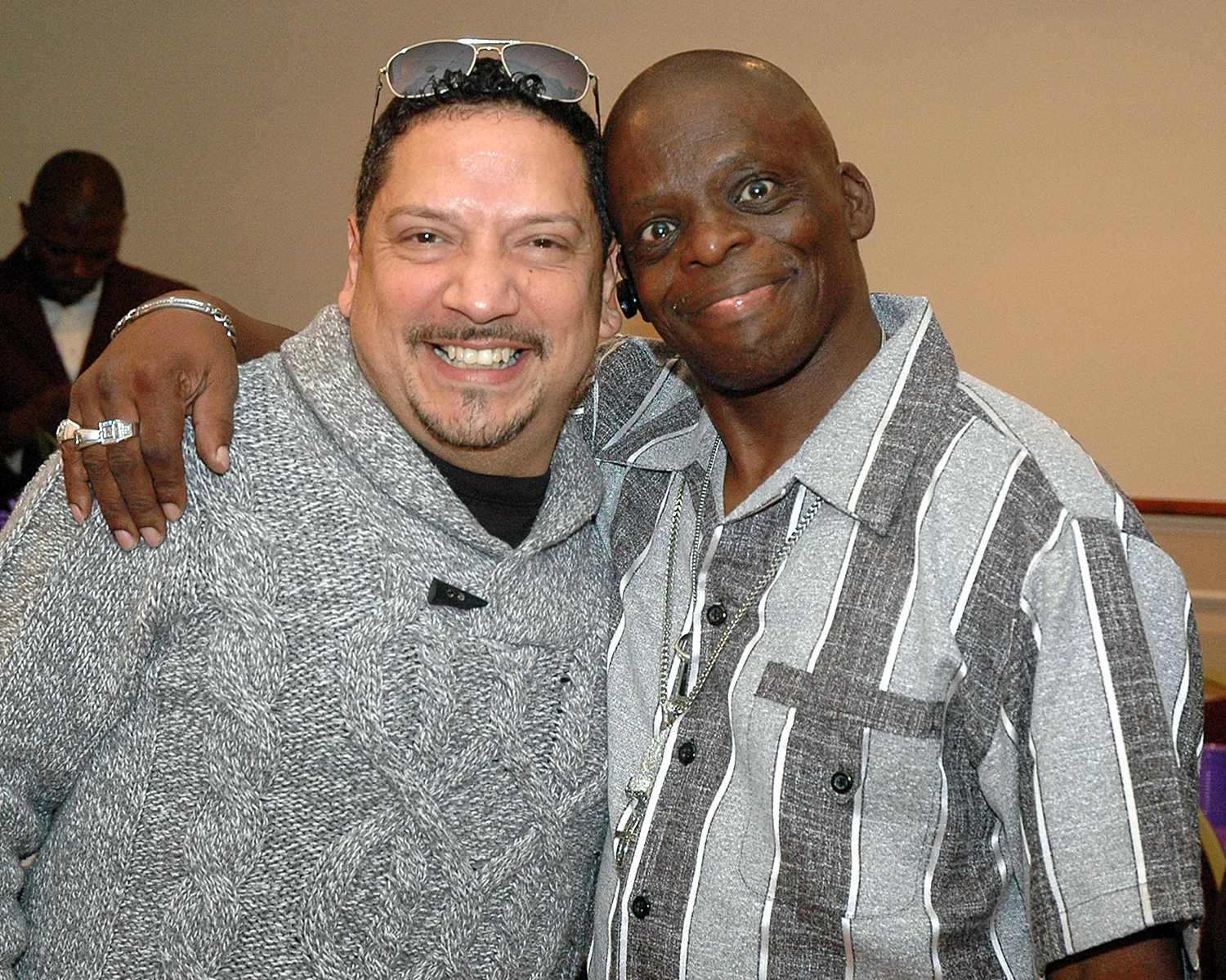 Two attendees posing for the camera