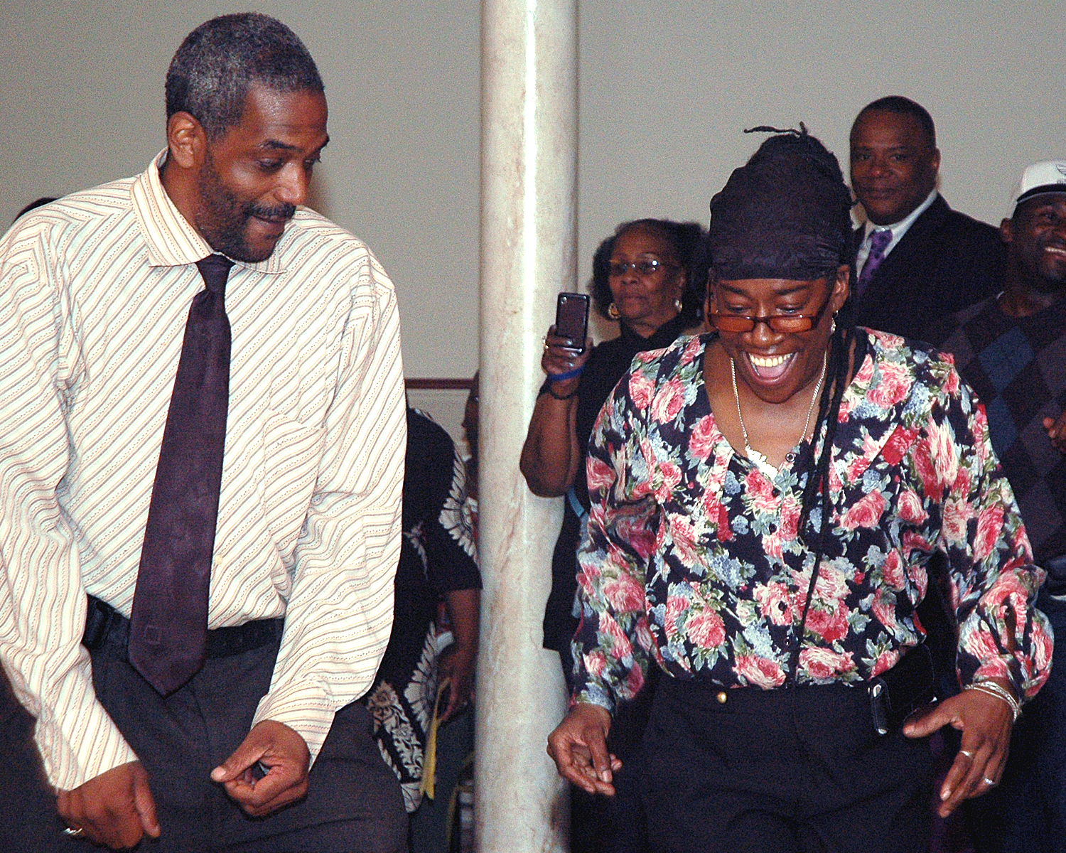 Two attendees on the dance floor