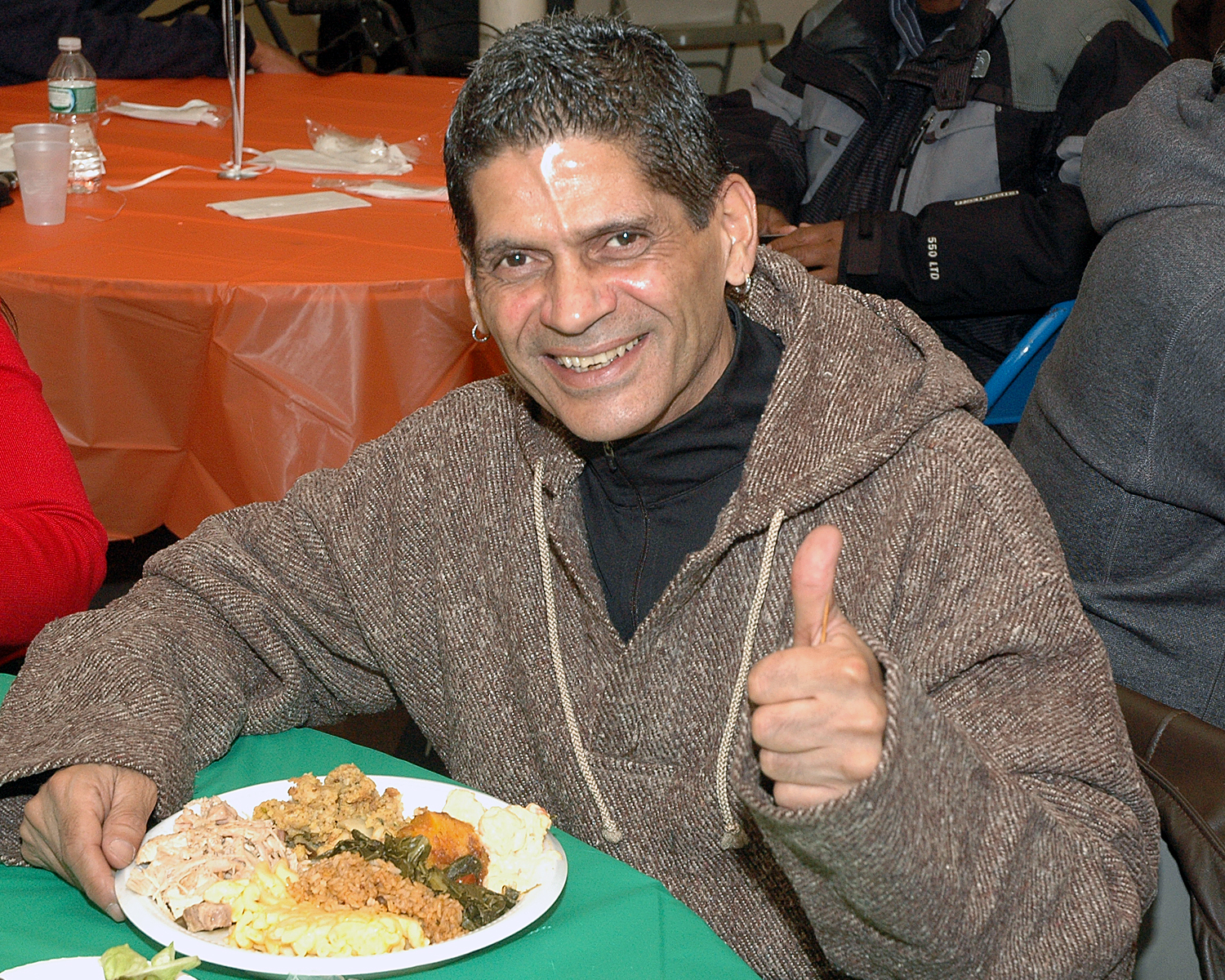 An attendee enjoying his meal