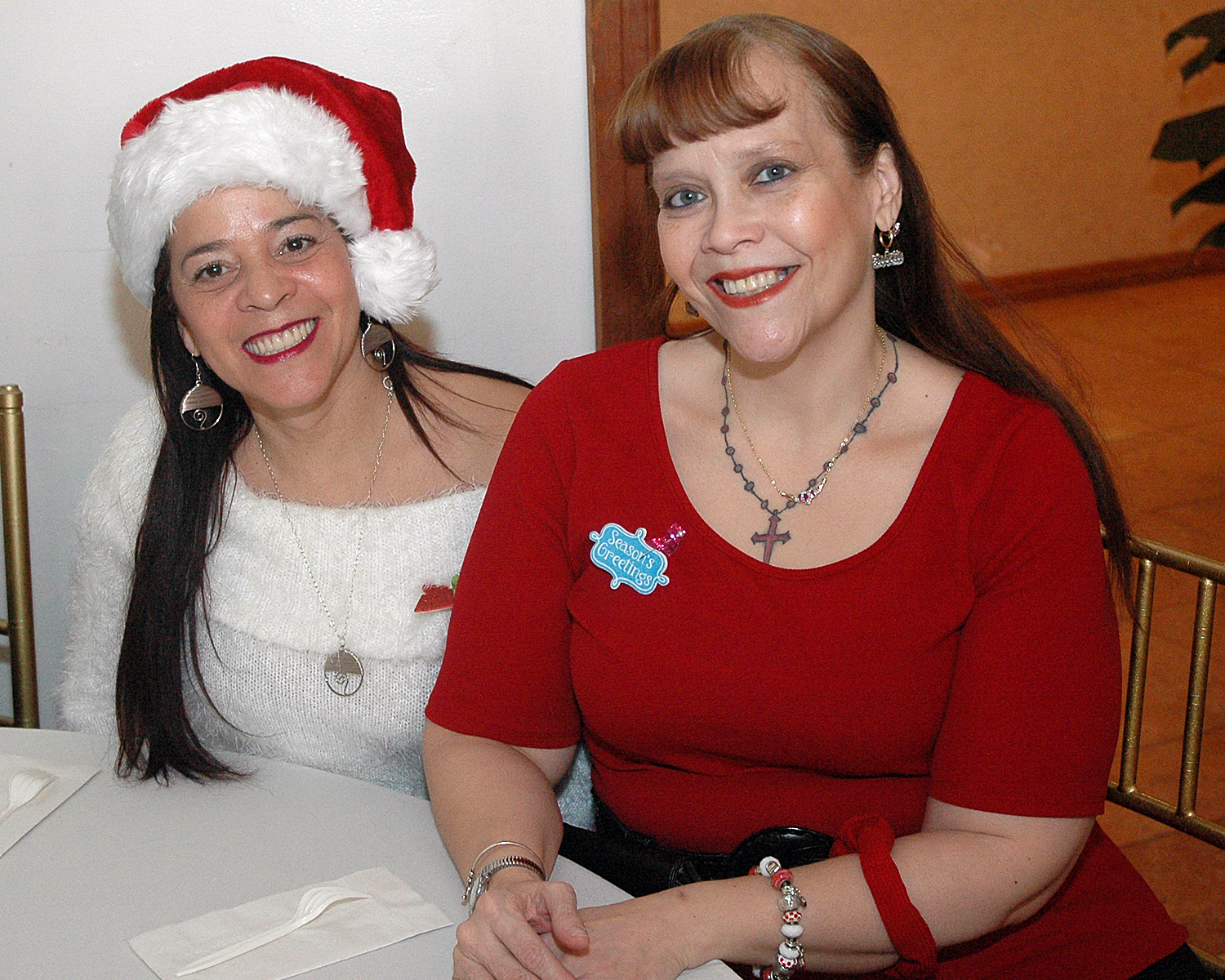 Two attendees enjoying the celebration