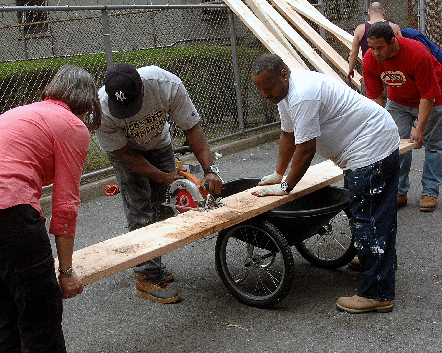 Members of the group building the planters