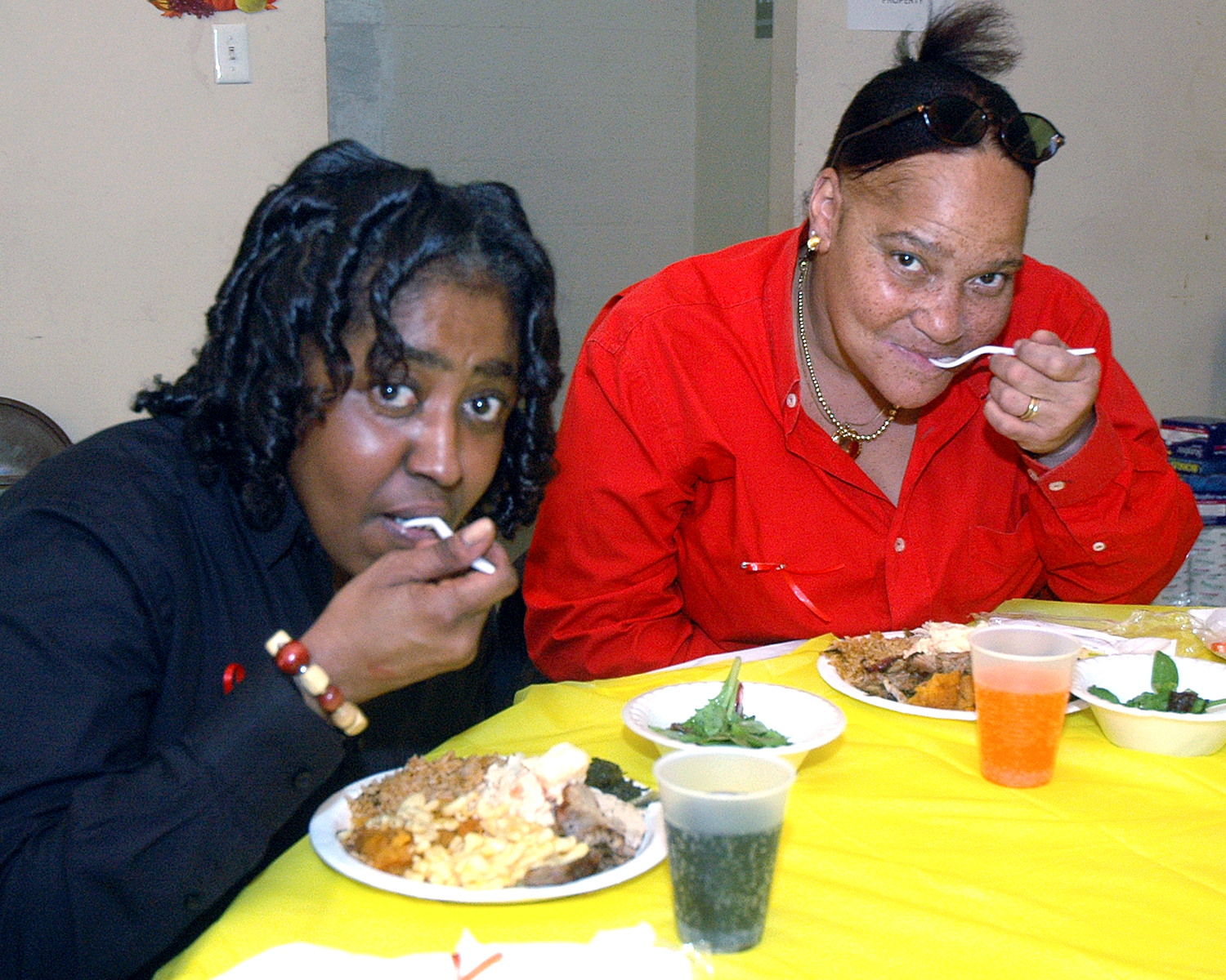 Two attendees enjoying their meal