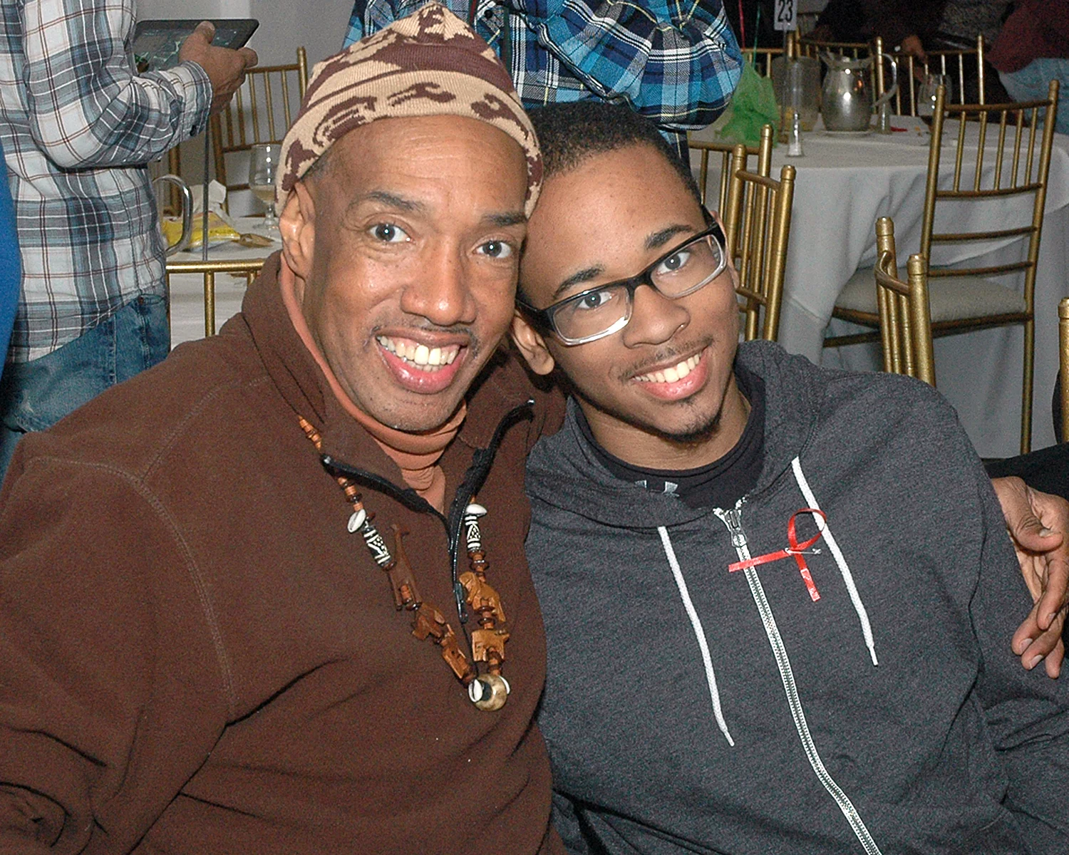Two attendees posing for the camera