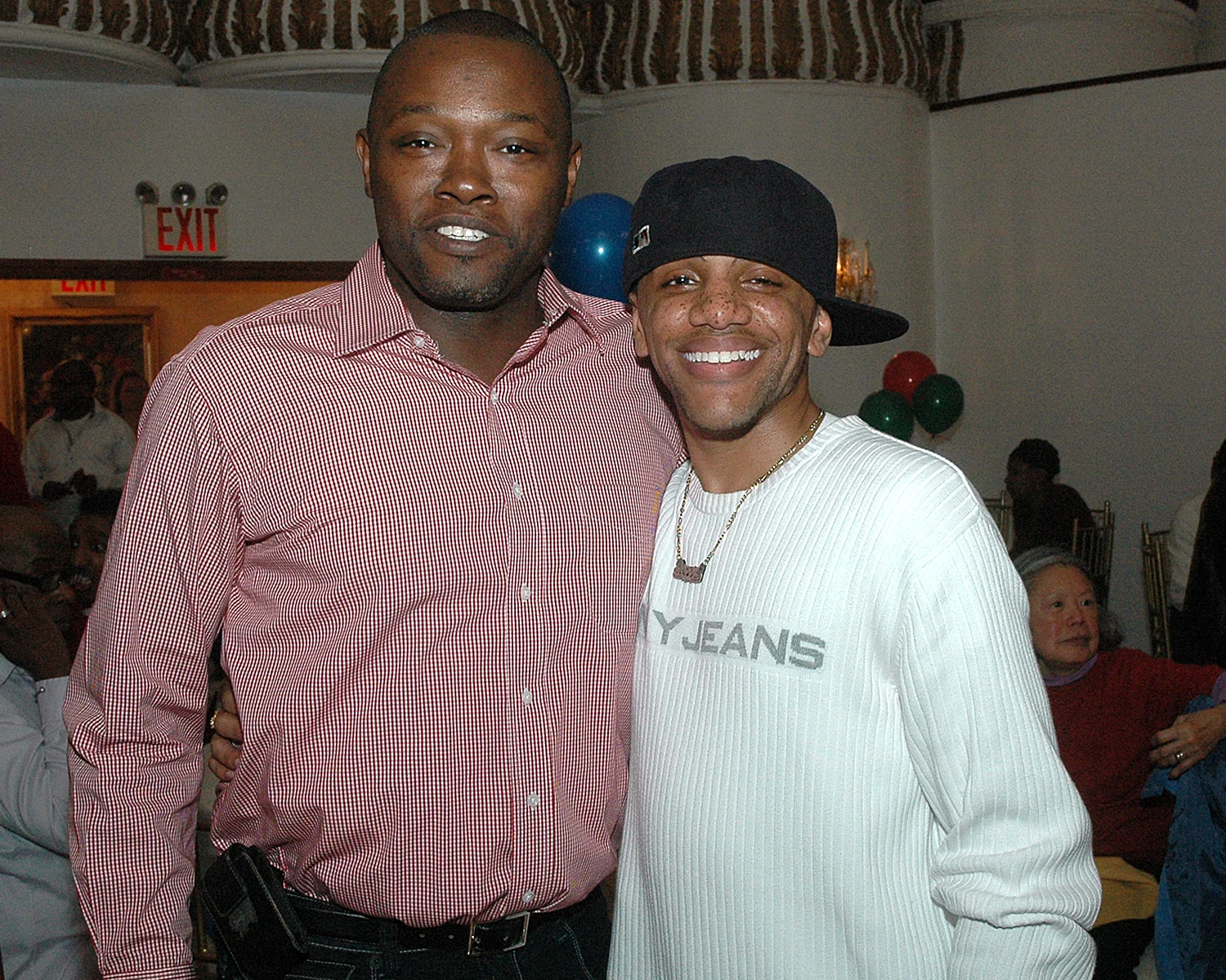 Two attendees posing for the camera