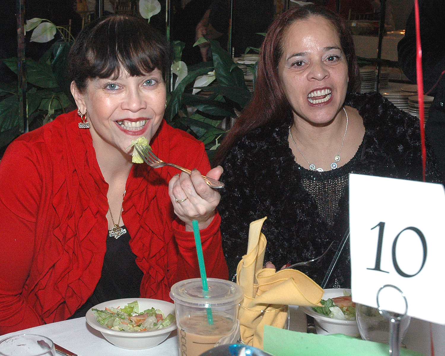 Two attendees enjoying their meal