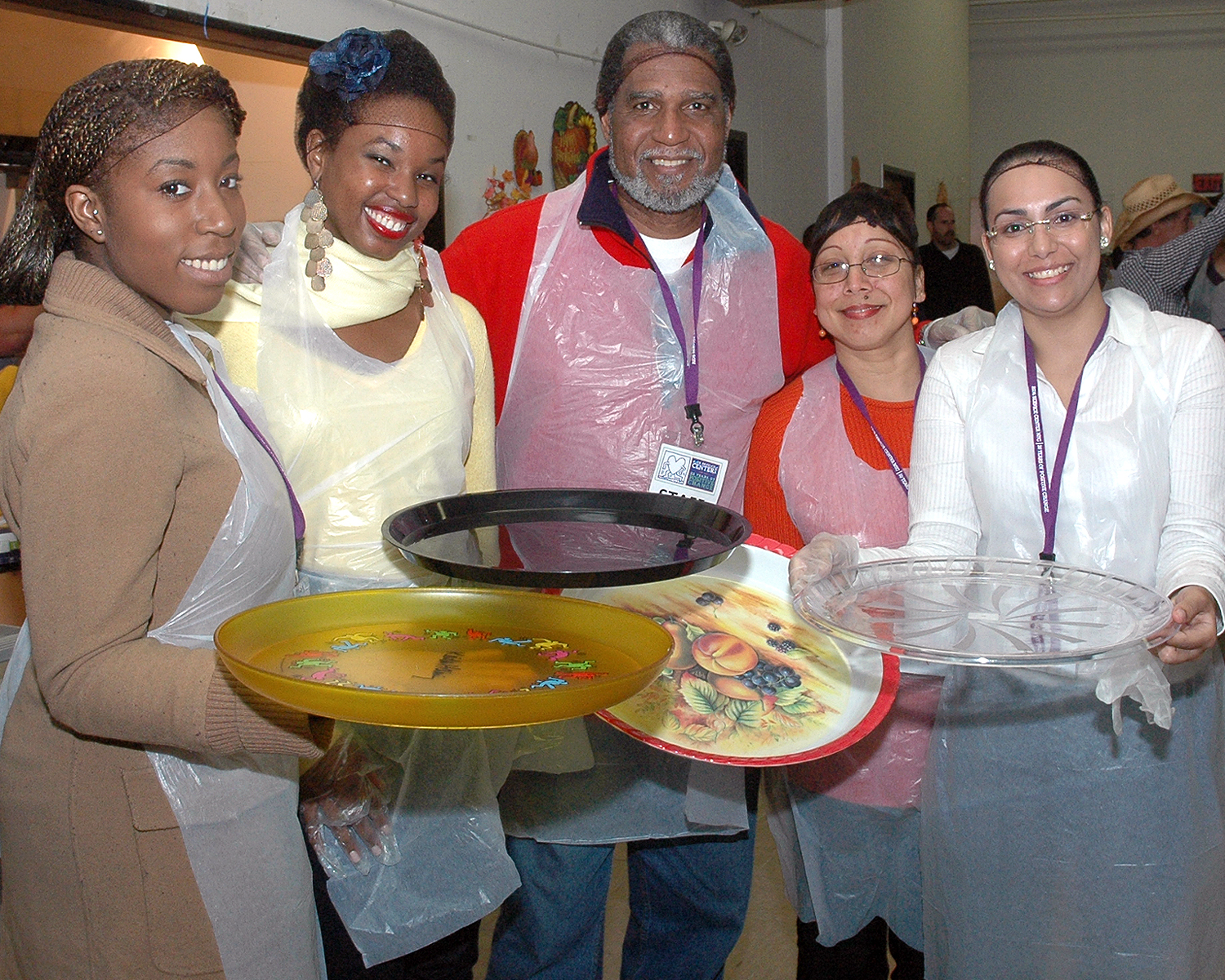 ASC Staff members getting ready to serve food to the attendees