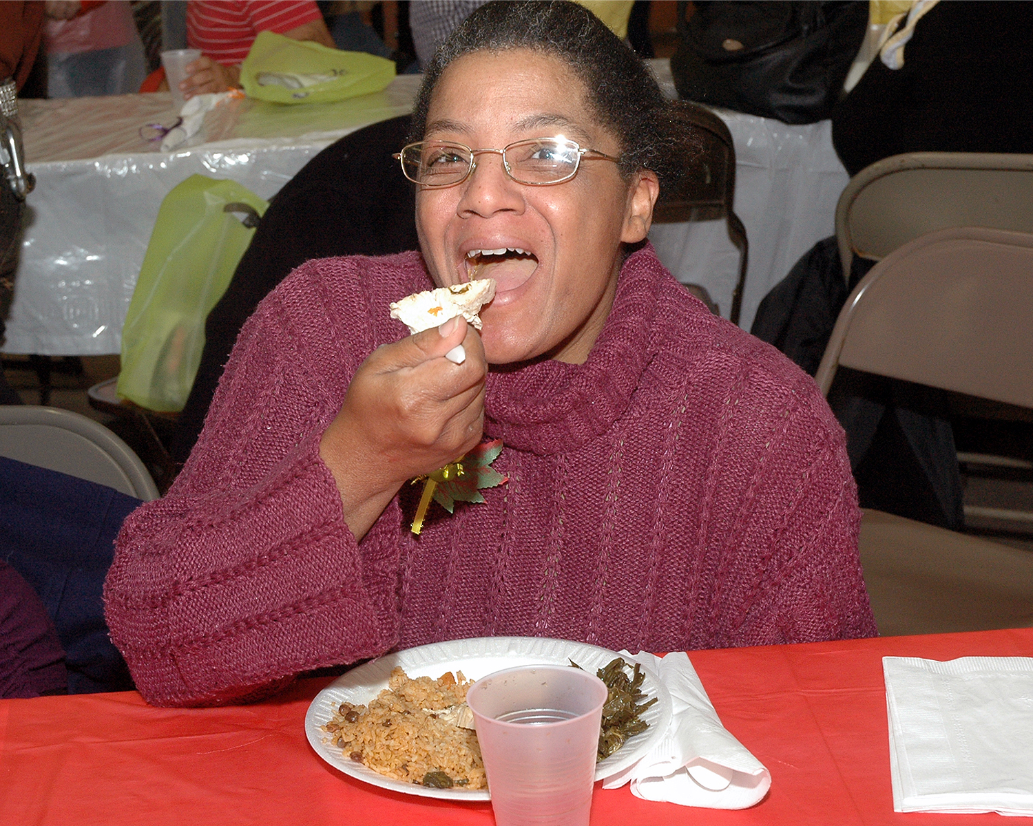 An attendee enjoying her meal