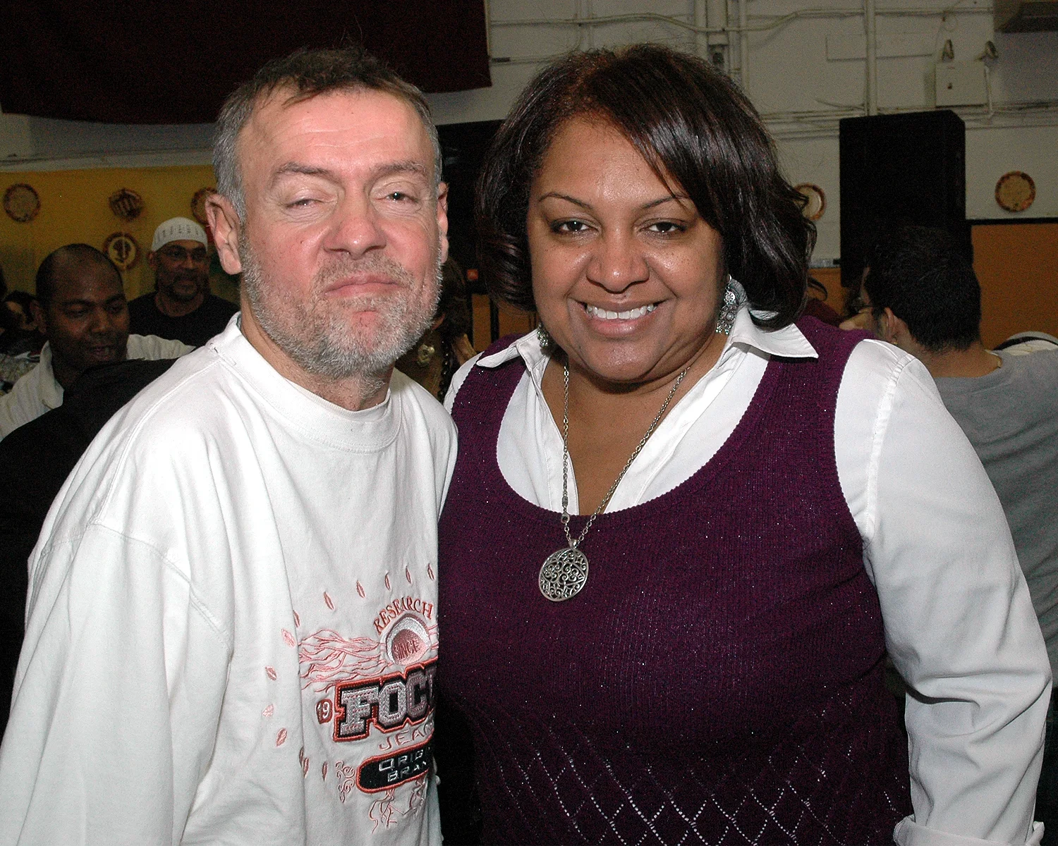 Fulvia Alvelo and attendee smiling for the camera
