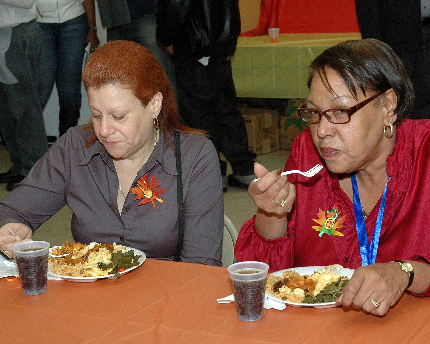 Two attendees enjoying their meal