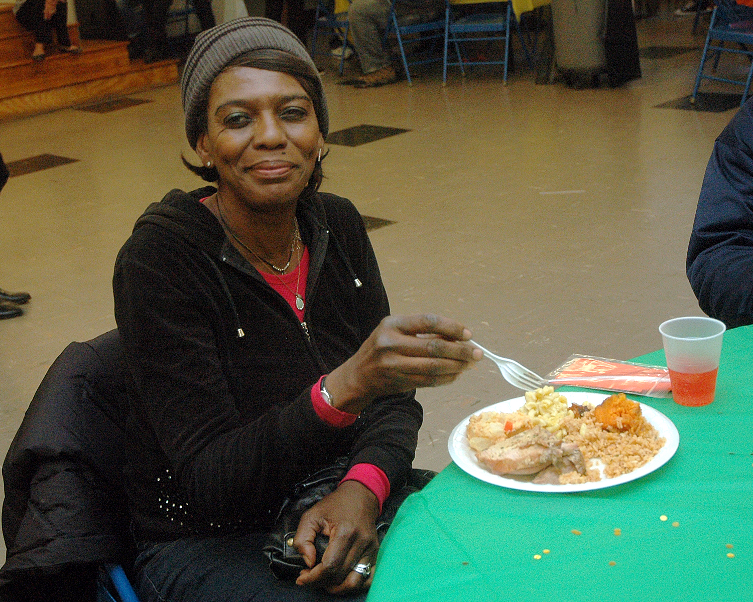 An attendee enjoying their meal