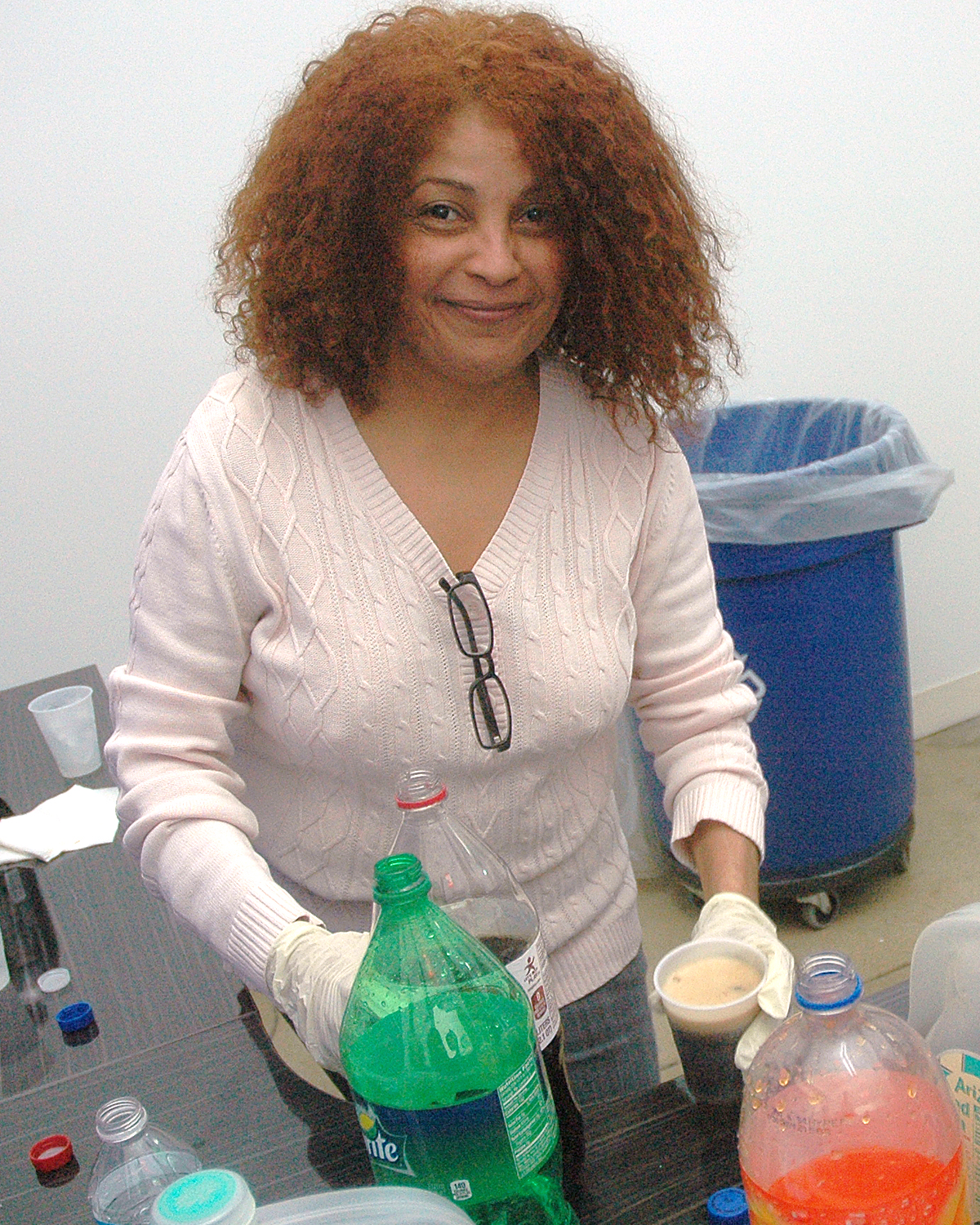 Velia Hernandez at the beverage station