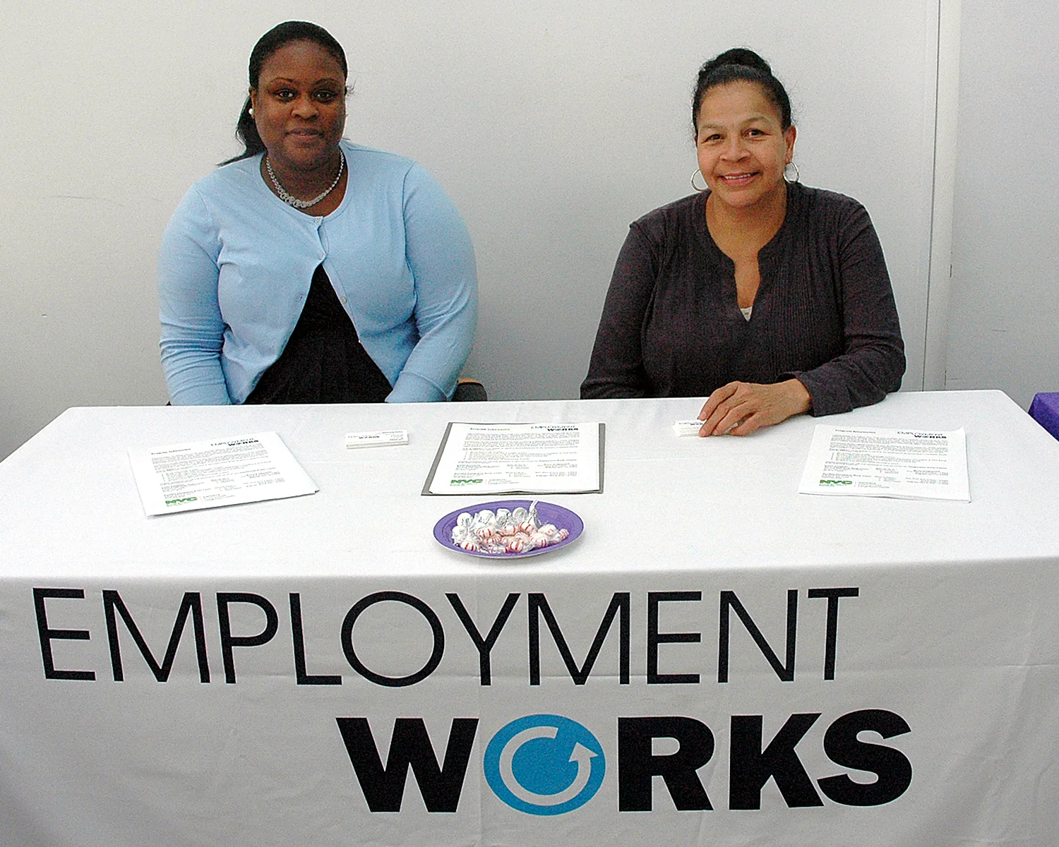 Two job fair interviewers