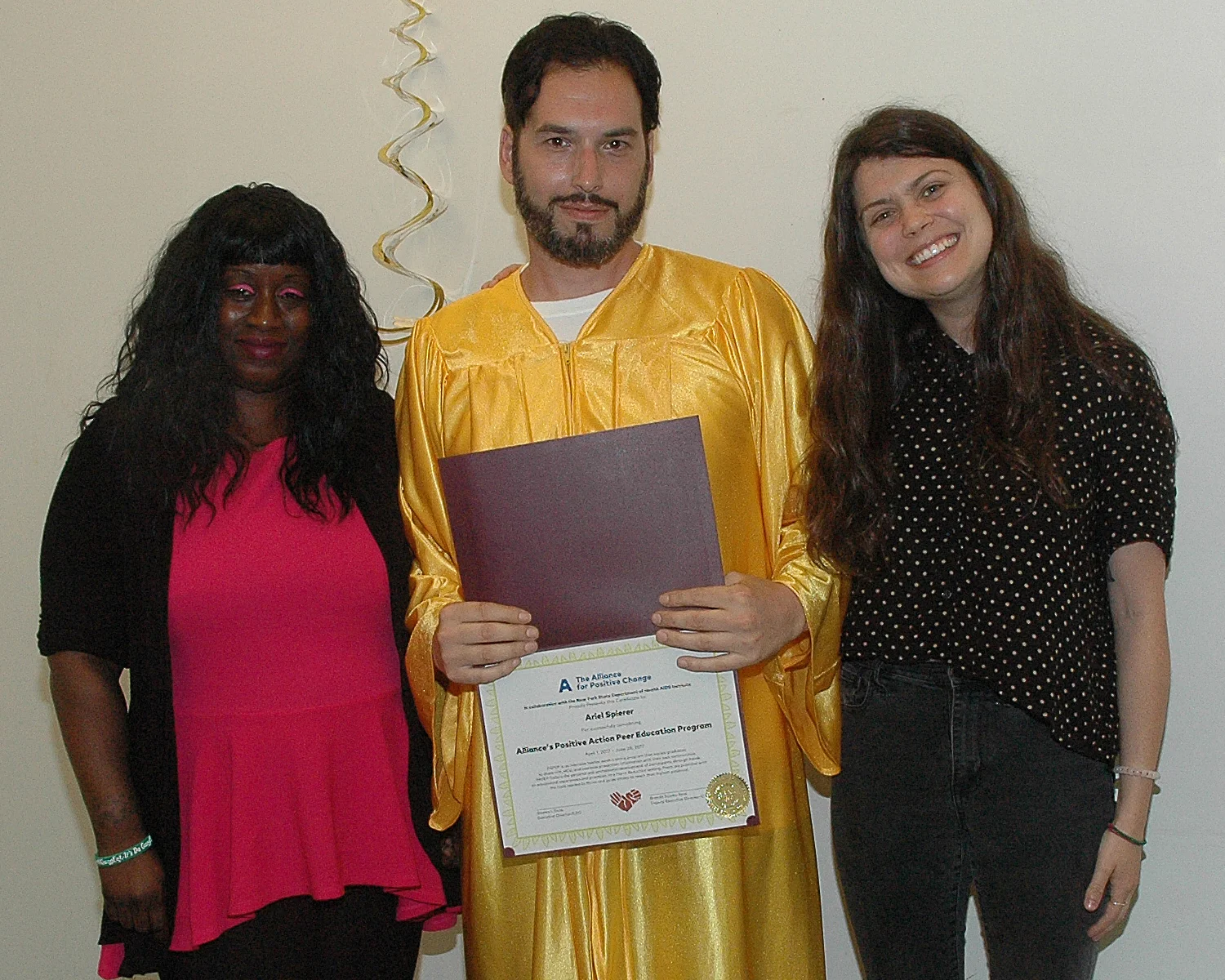 One of the graduates receiving his certificate