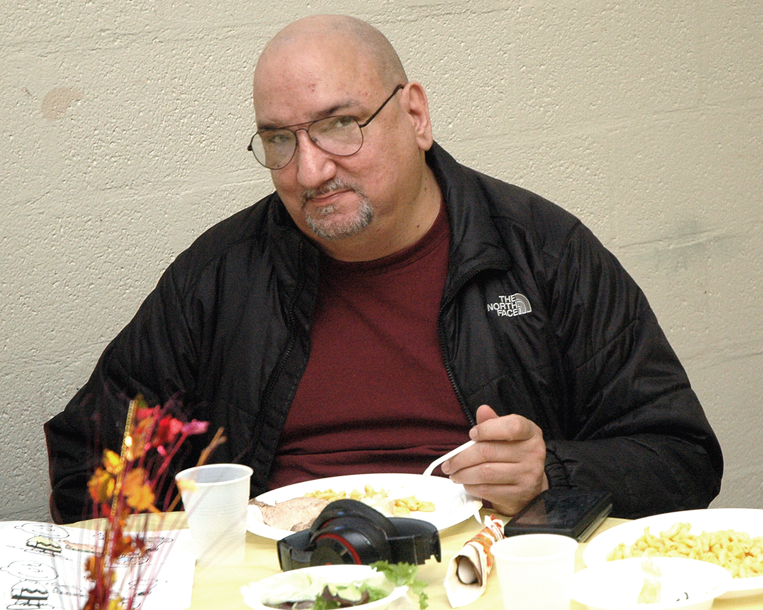 An attendee enjoying his meal