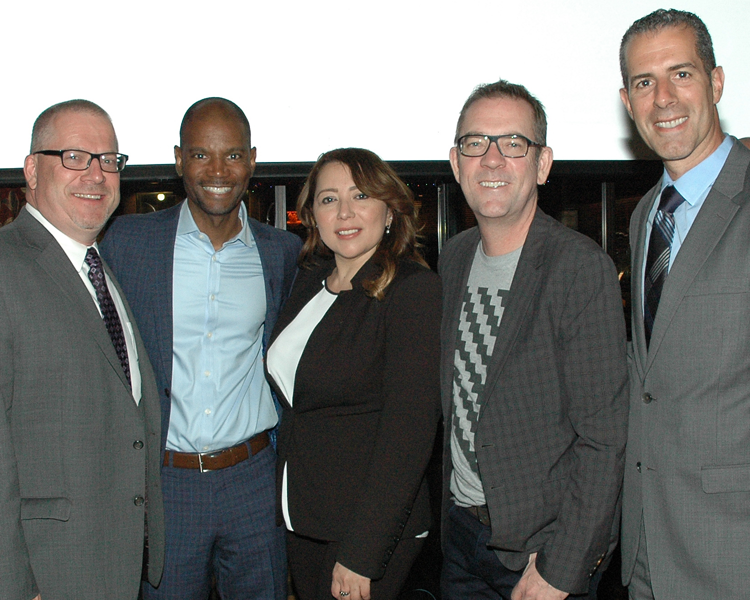 Vernon Watson, Paramount Speciality Pharmacy with Ted Allen and guests at Staghorn Steakhouse