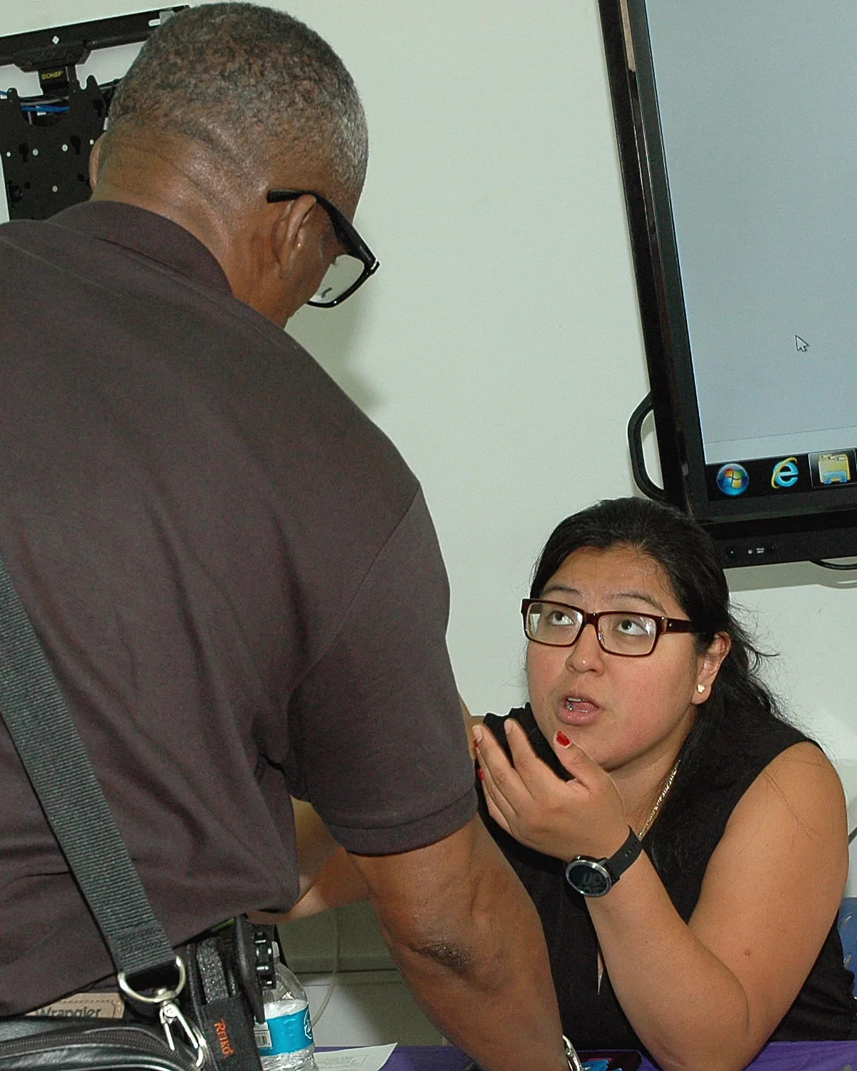 One of the job fair interviewers with an attendee