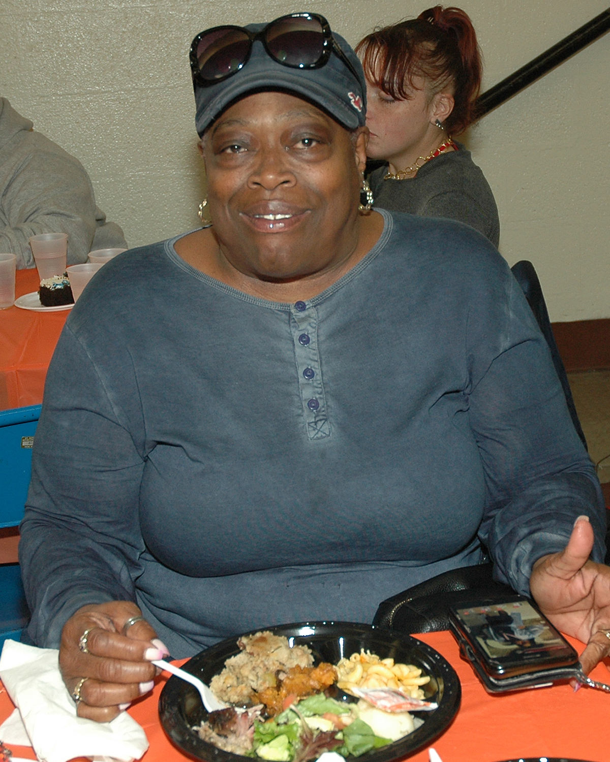 An attendee enjoying her meal