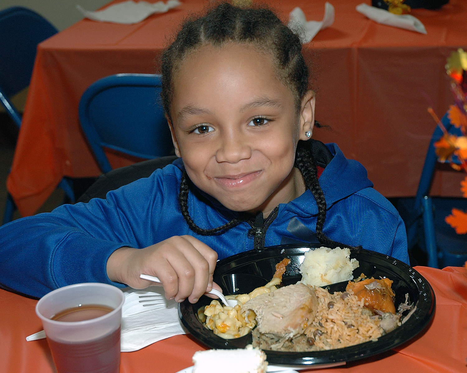 An attendee enjoying his meal