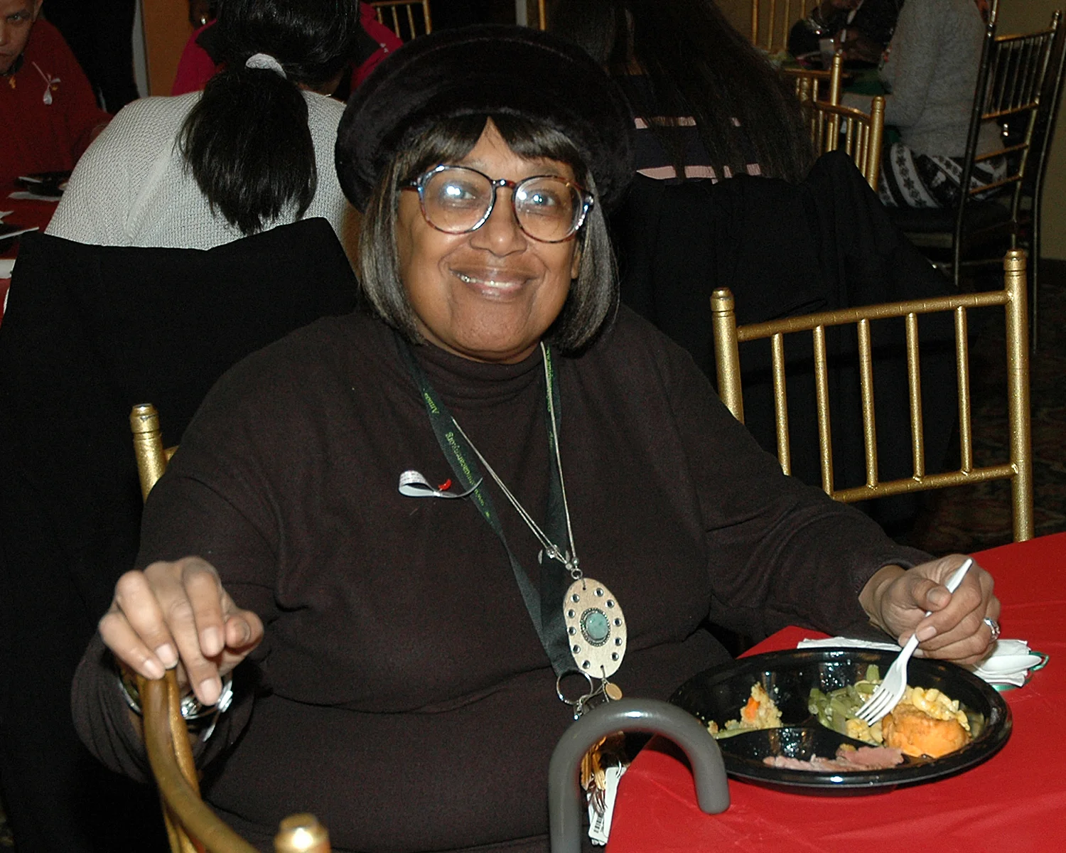 An attendee enjoying her meal