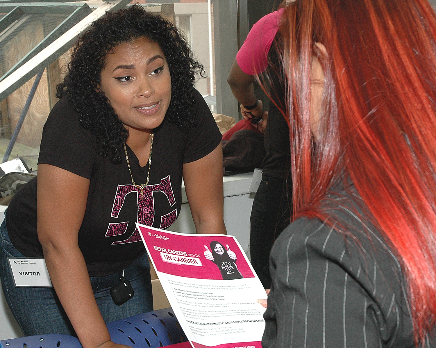 An interviewer from T-Mobile with an attendee