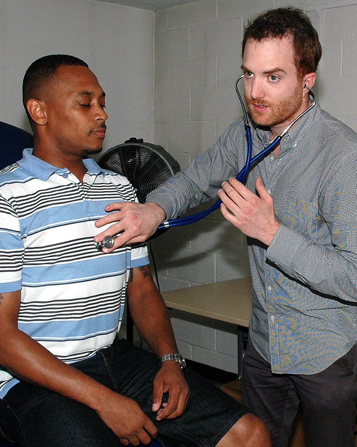 A Columbia University Medical Student with a patient