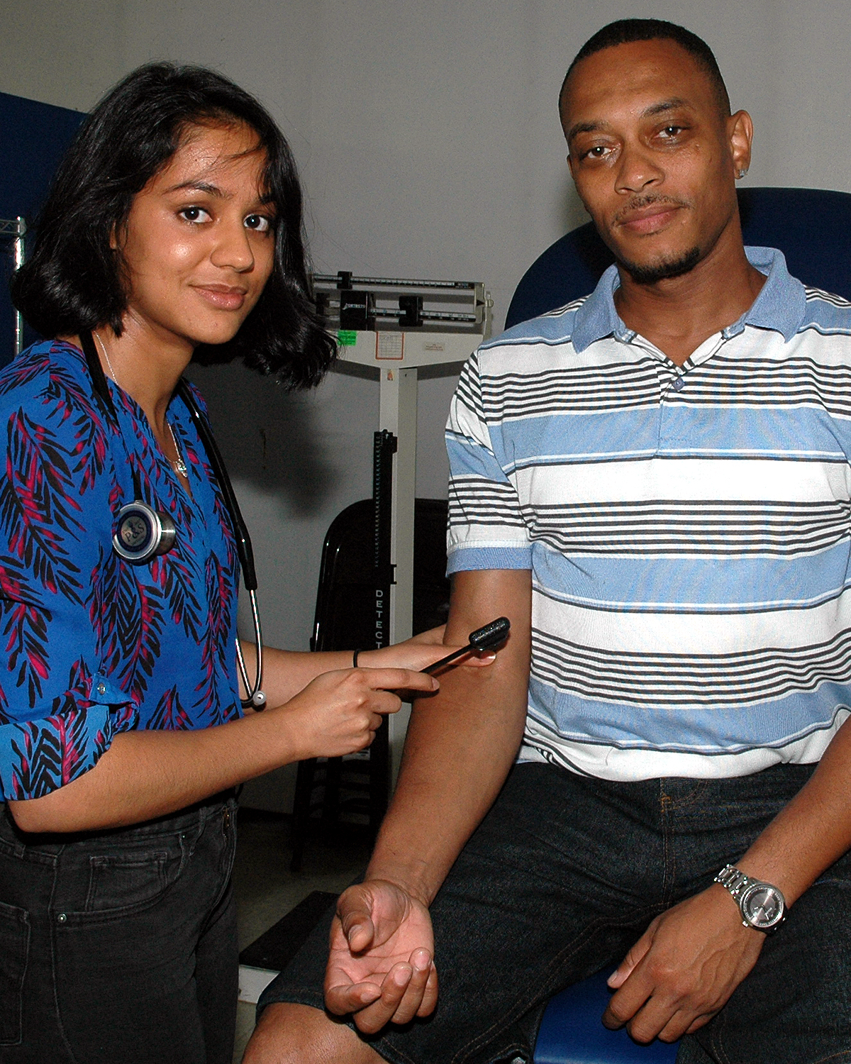 A Columbia University Medical Student with a patient