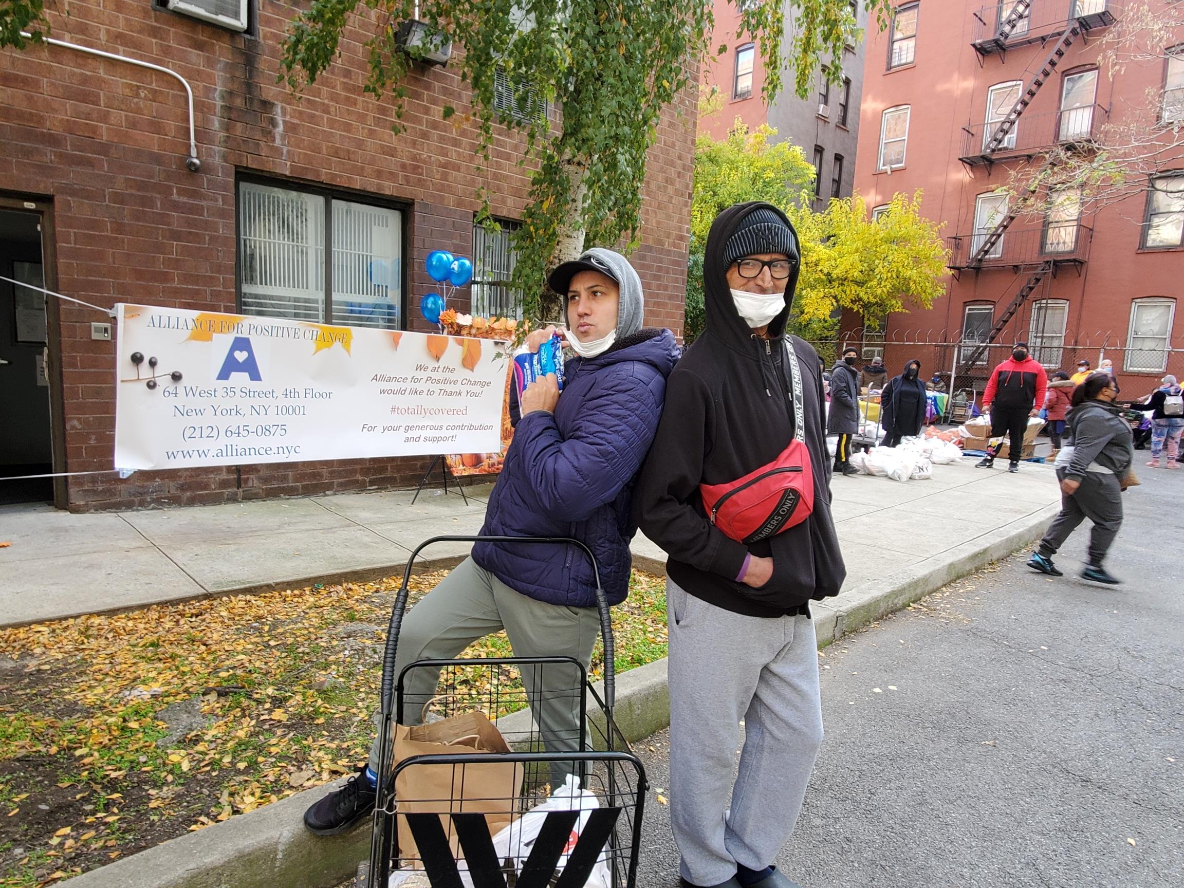 Two happy shoppers on their way to bring their Turkeys home
