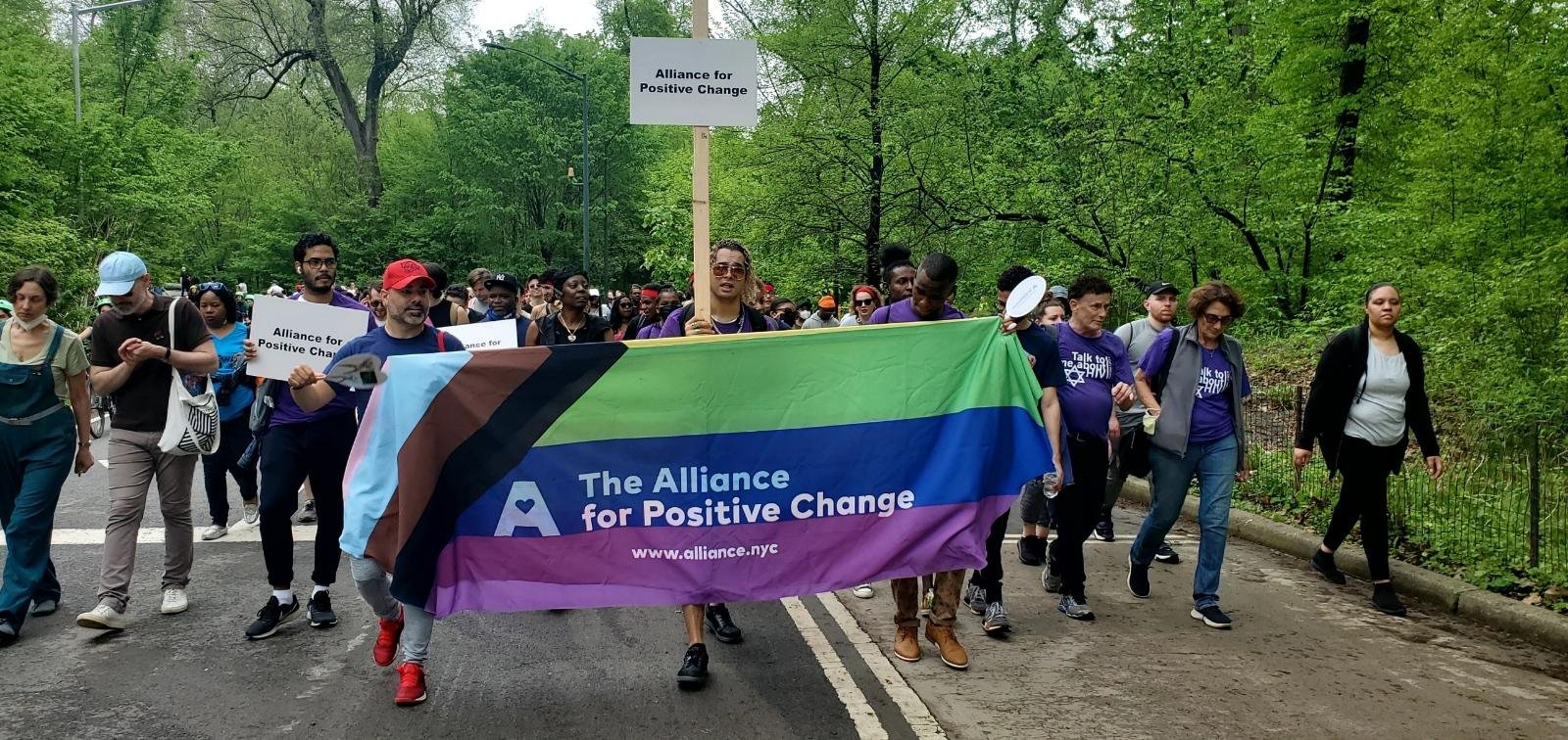 Michael Luis V walking with flag.jpg