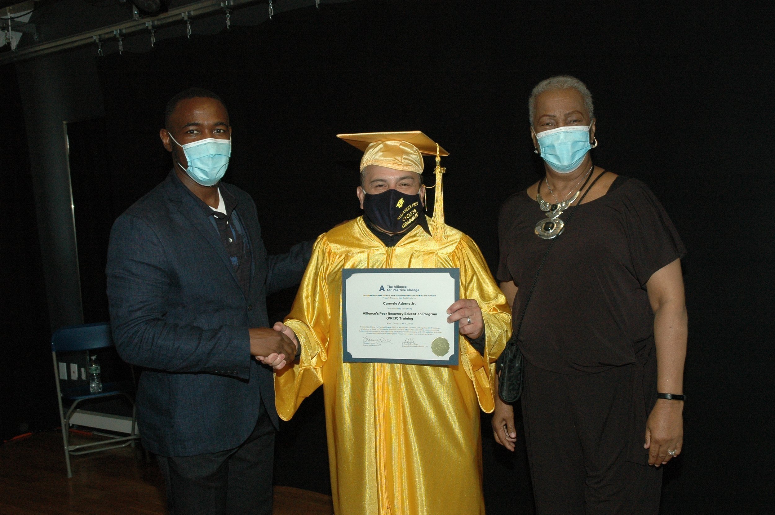 Carmelo Adorno, Jr., with Jean Pierre-Louis (left) and Joyce Myricks (right)